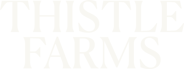 Black background with large white text reading "Thistle Farms".