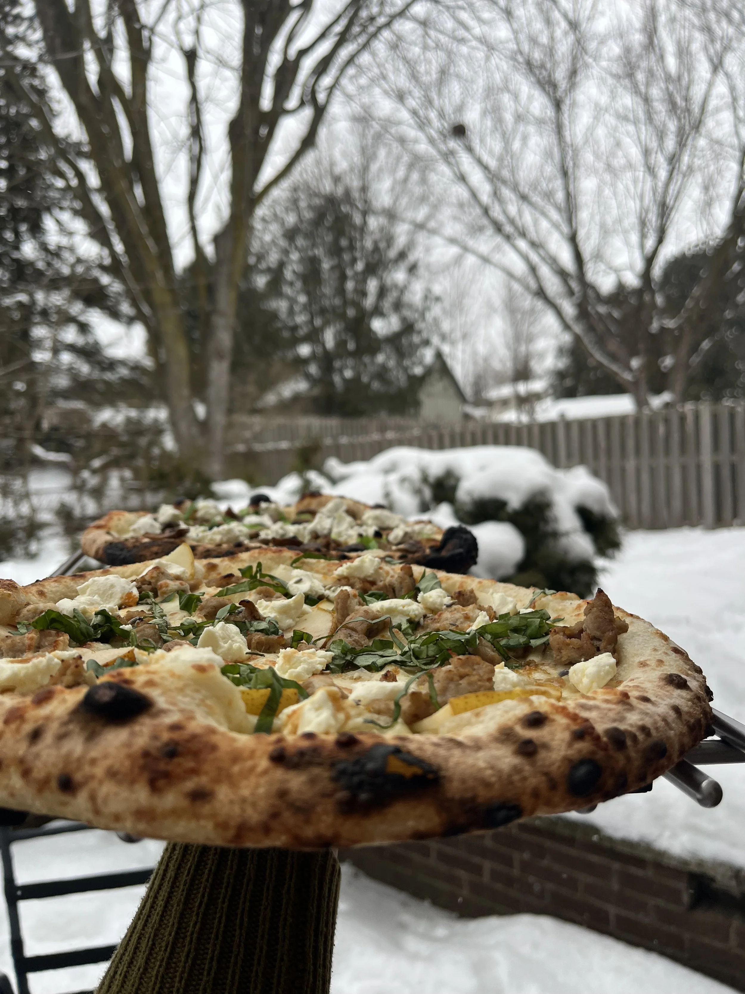 Women in PIzza feature pie, 2025: sausage, pear, basil, goat cheese and hot honey, all sourced from southern Ontario