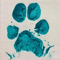 Blue ink paw print on a white background