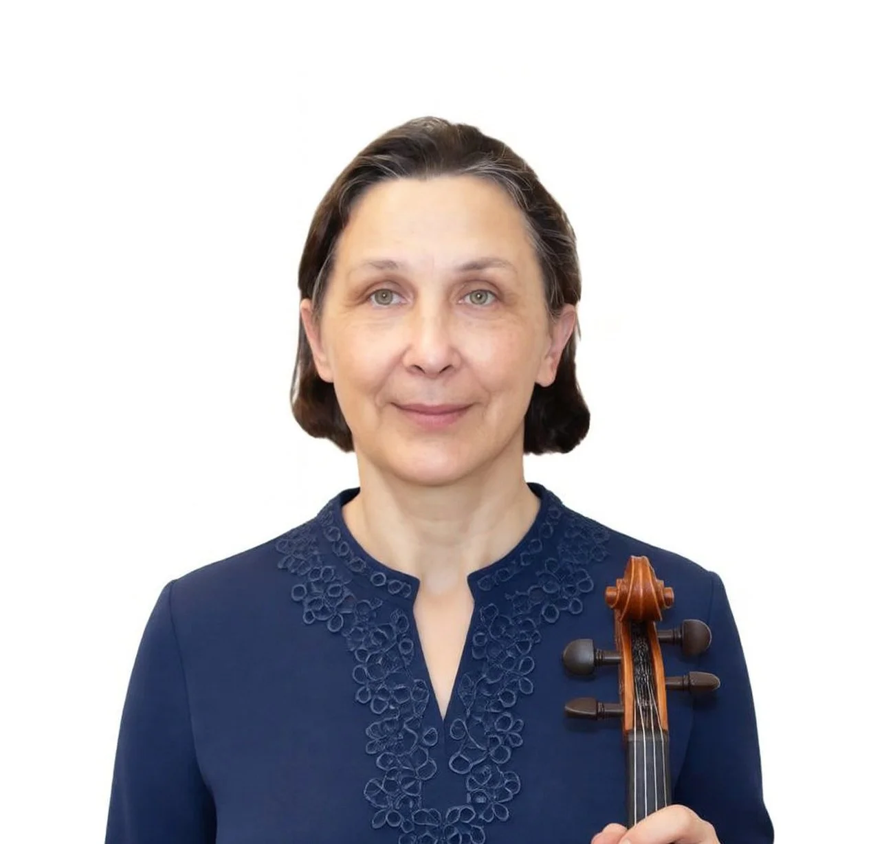 A woman with short dark hair holding a violin, wearing a navy blue blouse with embroidered details, standing against a white background.
