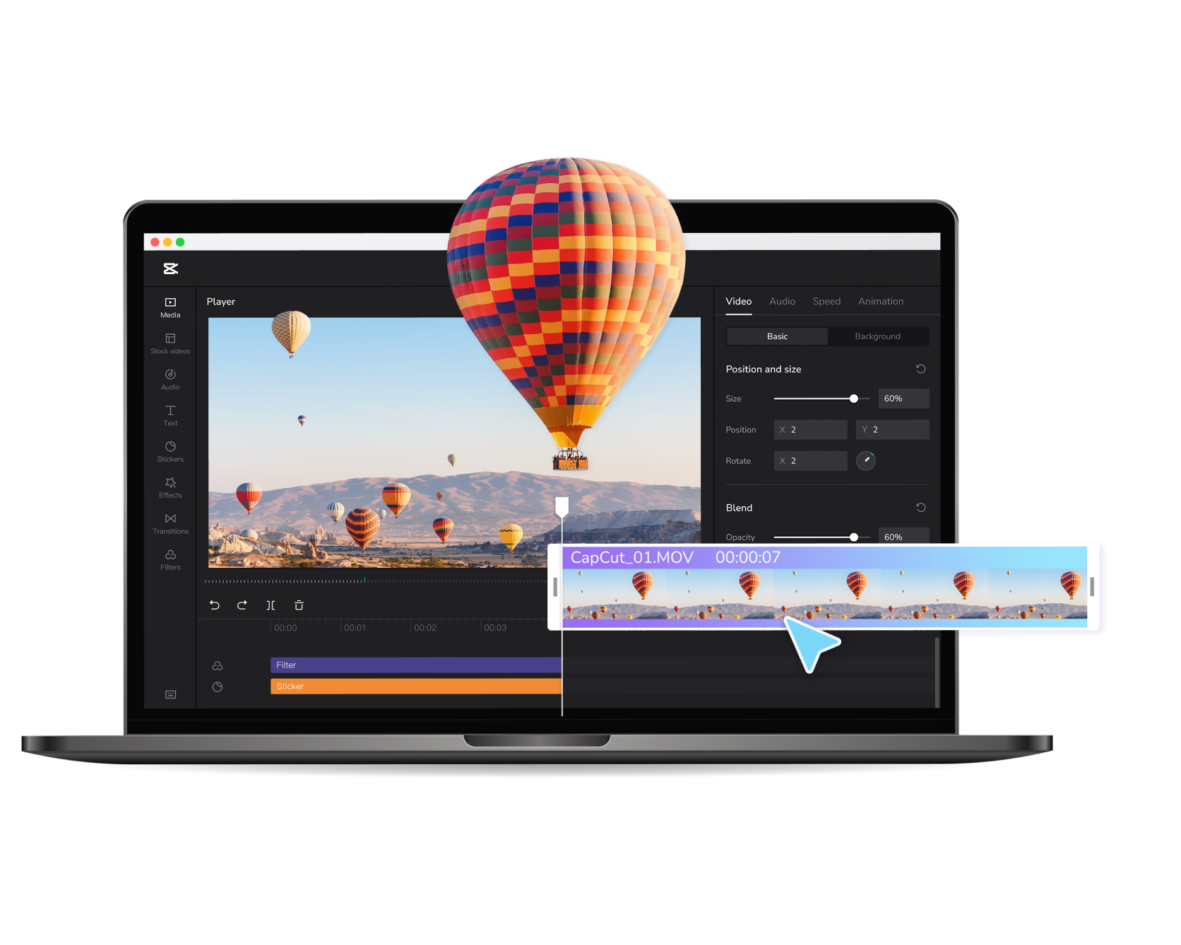 Pantalla de laptop mostrando un programa de edición de video con un video de globos aerostáticos en un paisaje despejado.