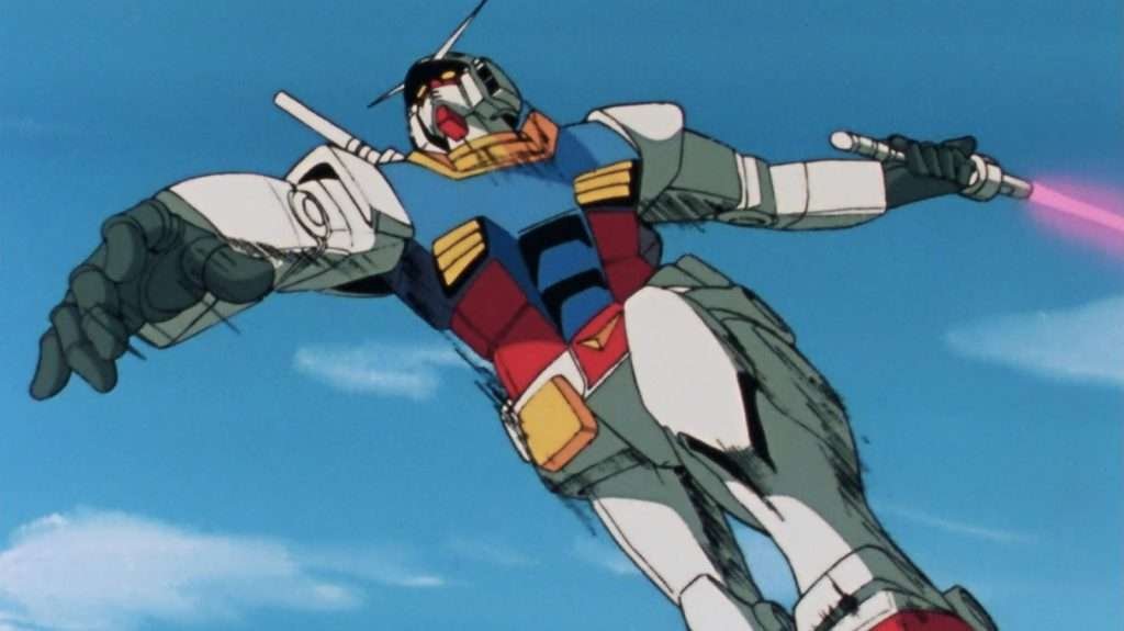 A giant mecha robot, standing in the sky with a blue background and clouds, with one arm extended and holding a pink energy weapon.