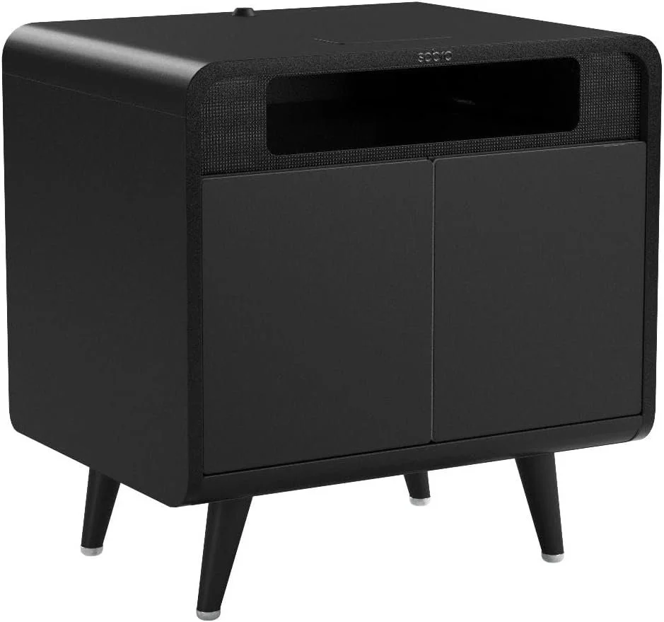 A black mid-century modern stereo console with a speaker grille, a display window, and cabinet doors, standing on four angled legs.