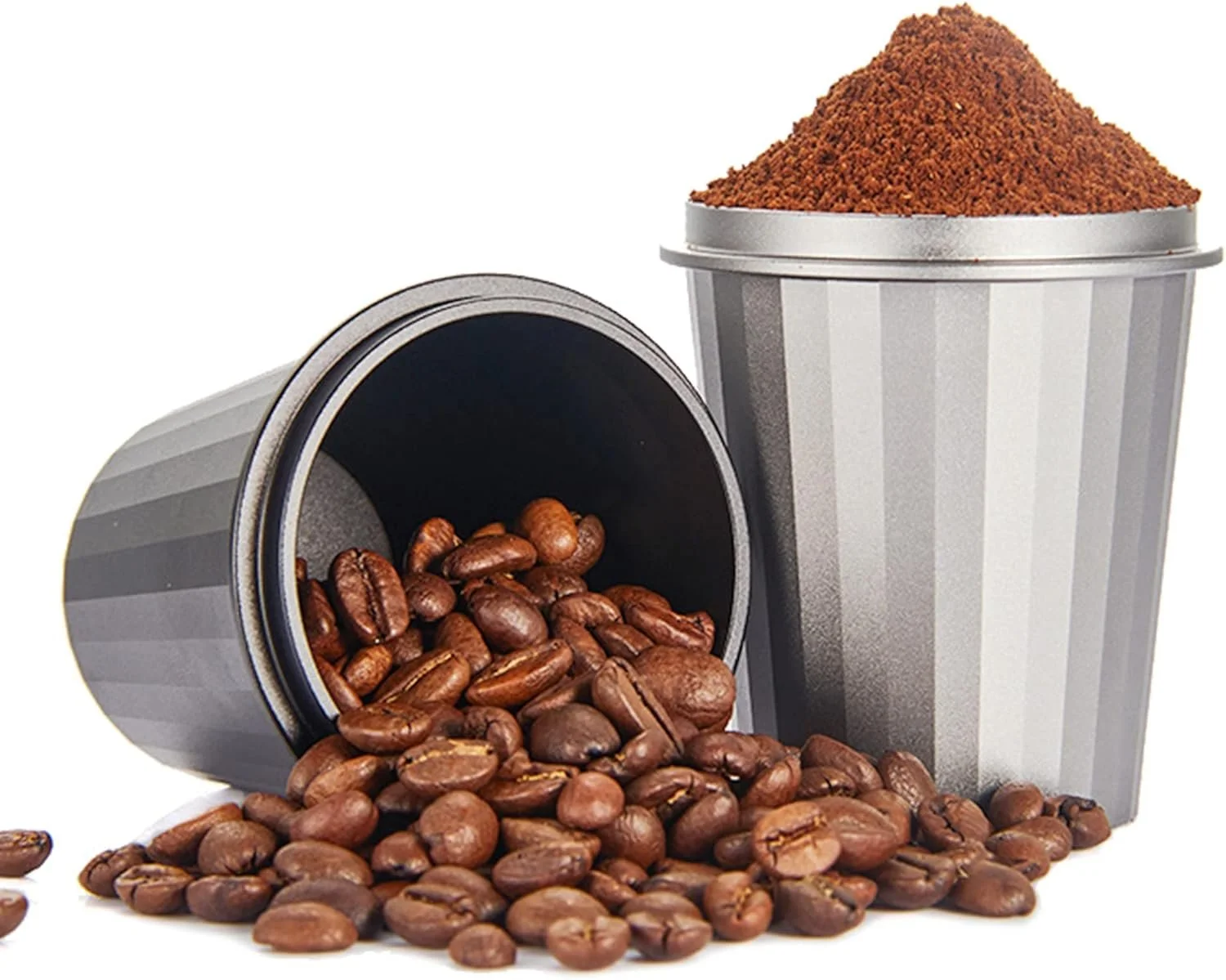 Coffee beans spilling from a gray container to the left and a peaked container of ground coffee on the right.