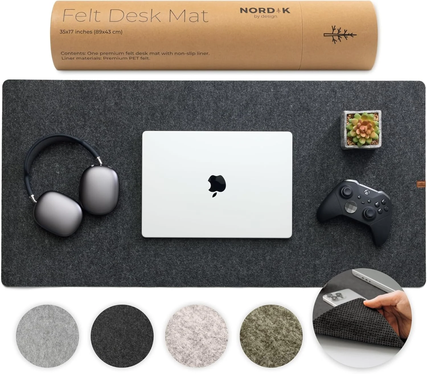 Felt desk mat with a white MacBook, black Xbox controller, gray wireless headphones, a small potted succulent plant, and a circular inset showing a hand lifting the corner of the mat, which has a textured surface and five color options at the bottom.