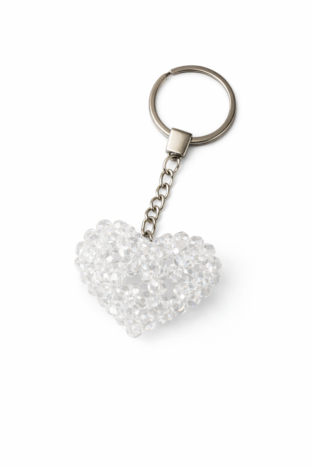 Clear heart keychain on silver ring.png