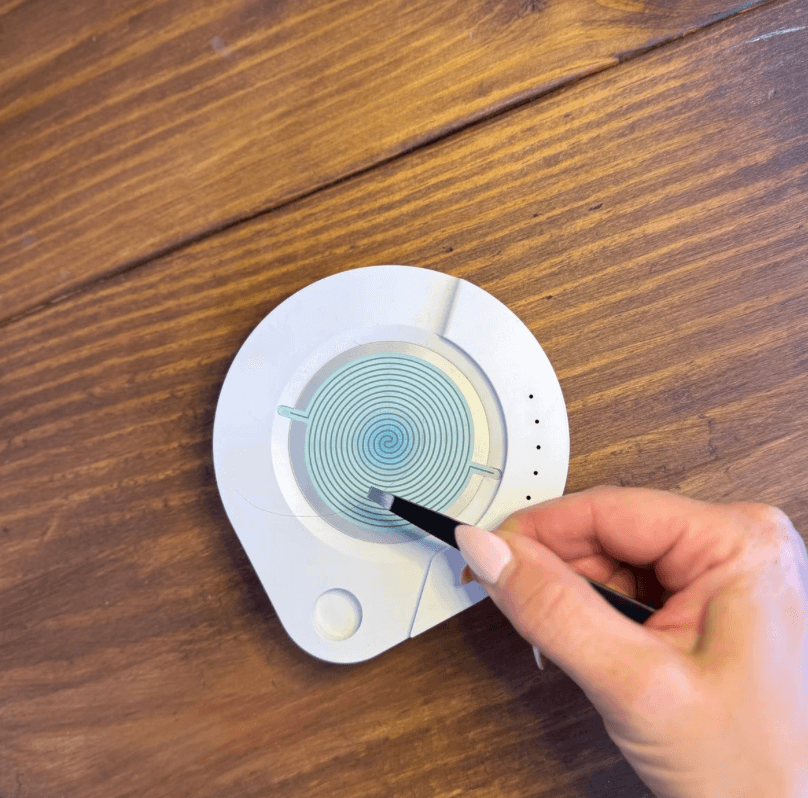 Epigenetic hair testing sample being prepared for analysis during a hair health assessment at Root Revival Hair Restoration in Cumming Georgia serving Forsyth County