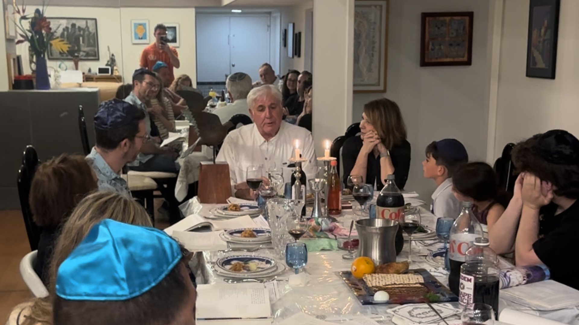 Rabbi Arnold Rachlis, who spoke 30 years ago at the unveiling of the monument, hosts the dove during Passover dinner