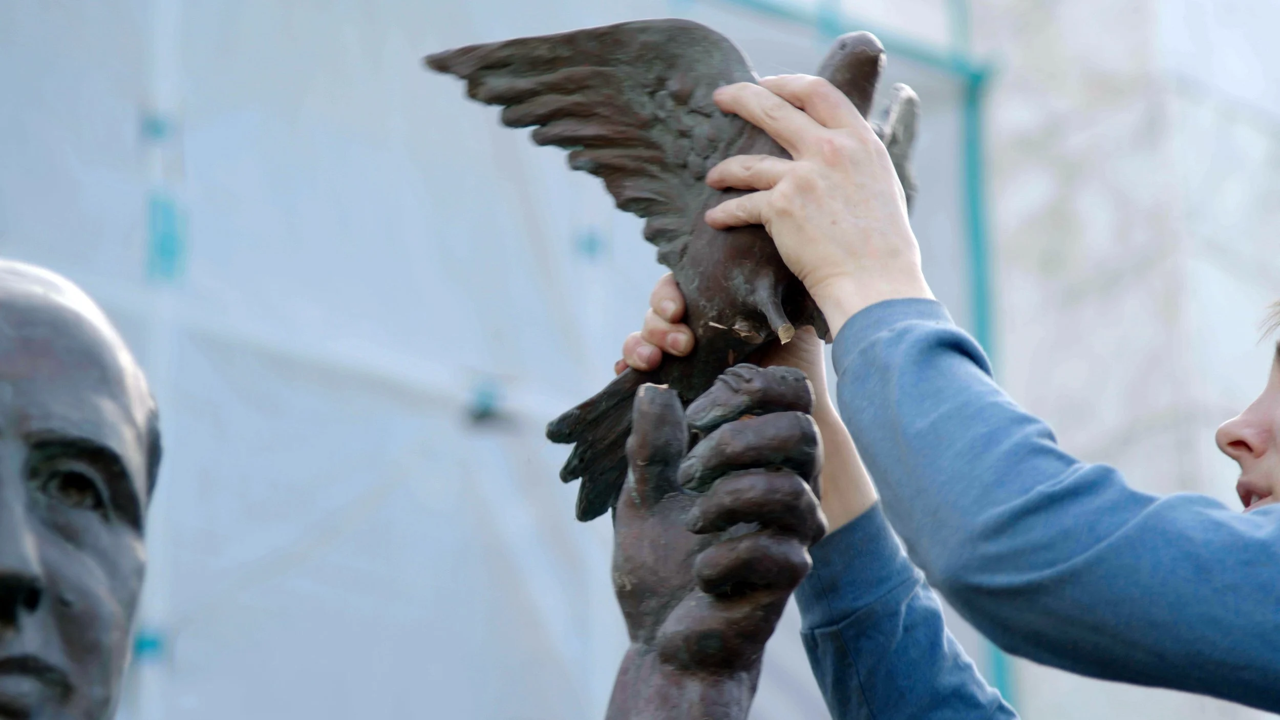 lifting dove off sculture 2.jpg