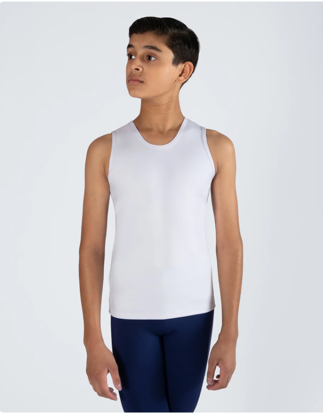 A young boy with short dark hair, wearing a white sleeveless athletic shirt and navy blue pants, standing against a plain white background and looking to the side.