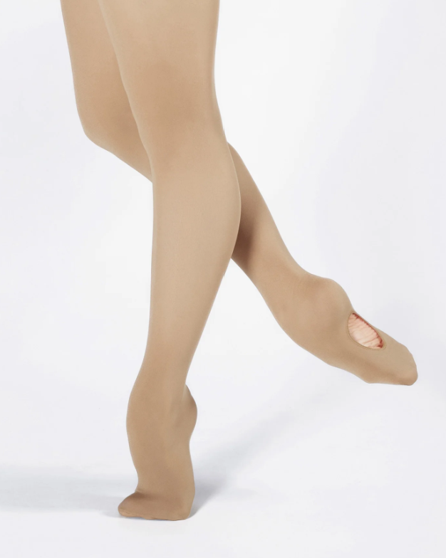 Person wearing beige tights with one leg bent backward, revealing a prosthetic foot with a sock and toes.