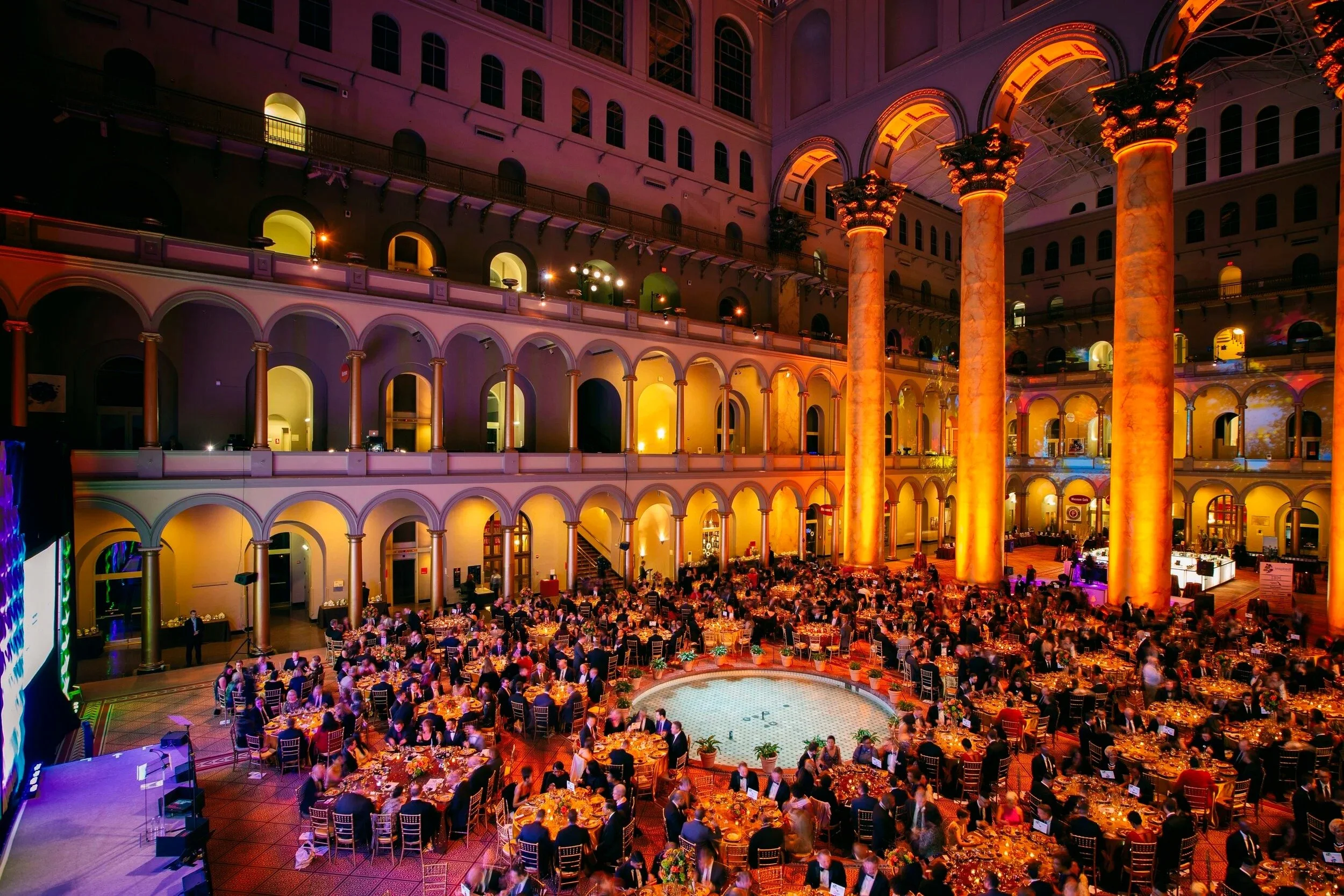 crowd at an event having dinner
