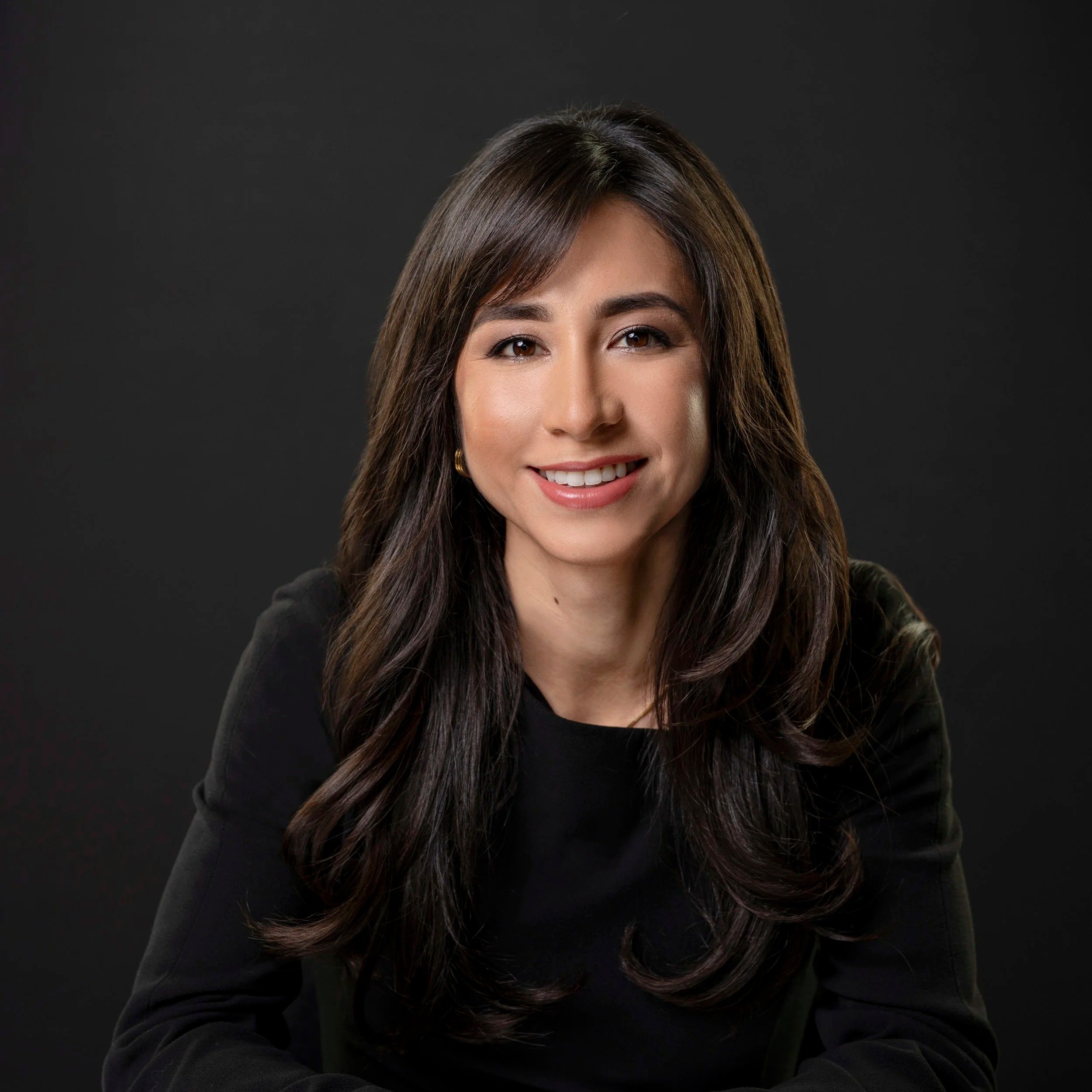 Portrait Photoshoot of a woman in b&w background