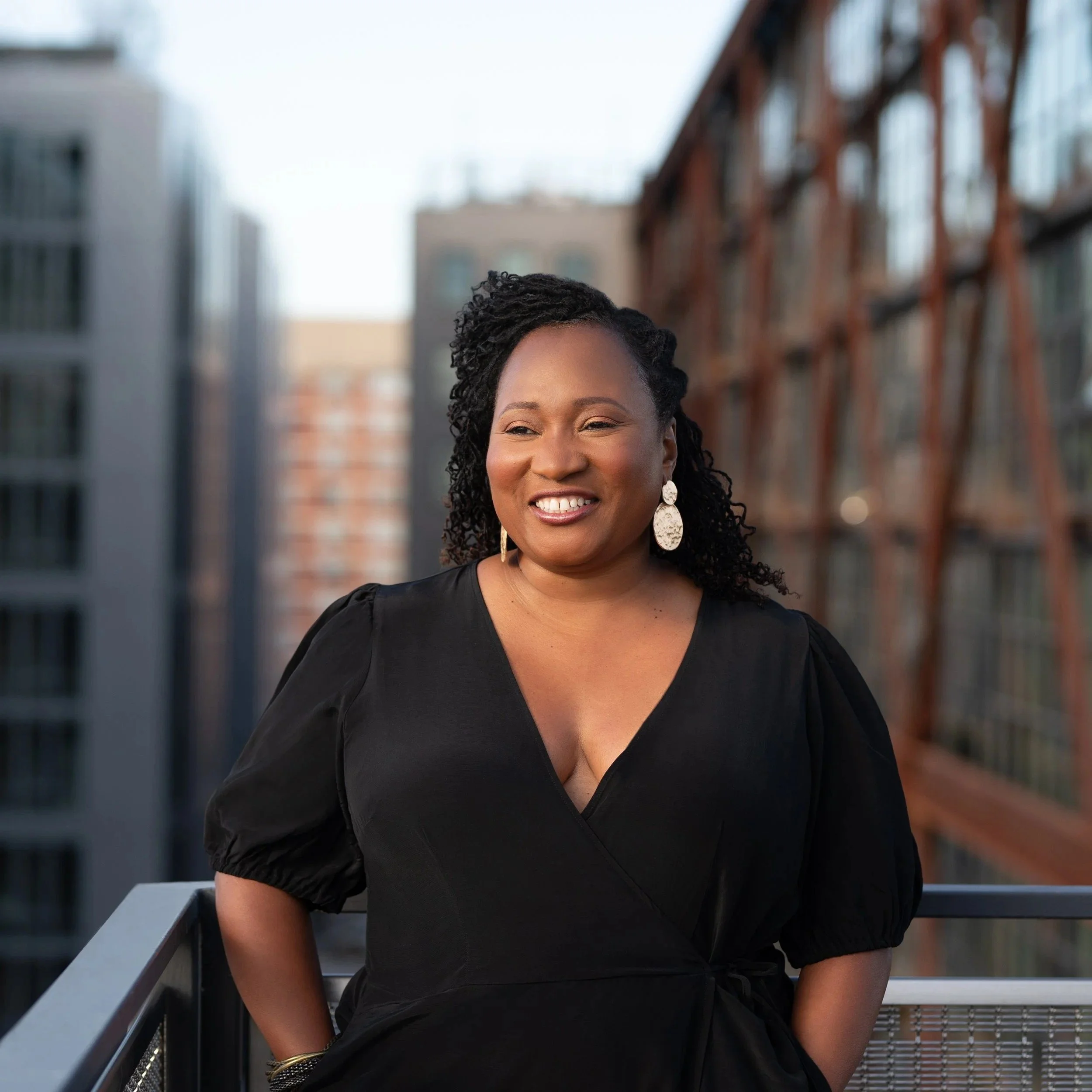 oversize woman smiling for a photoshoot