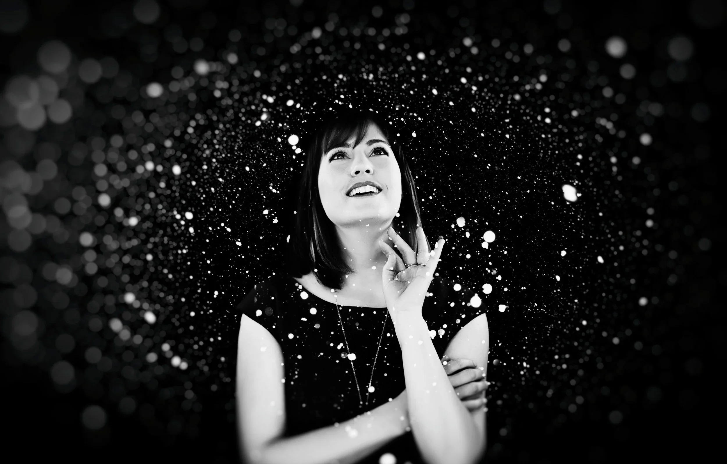 A lady wondering seeing stars around her.