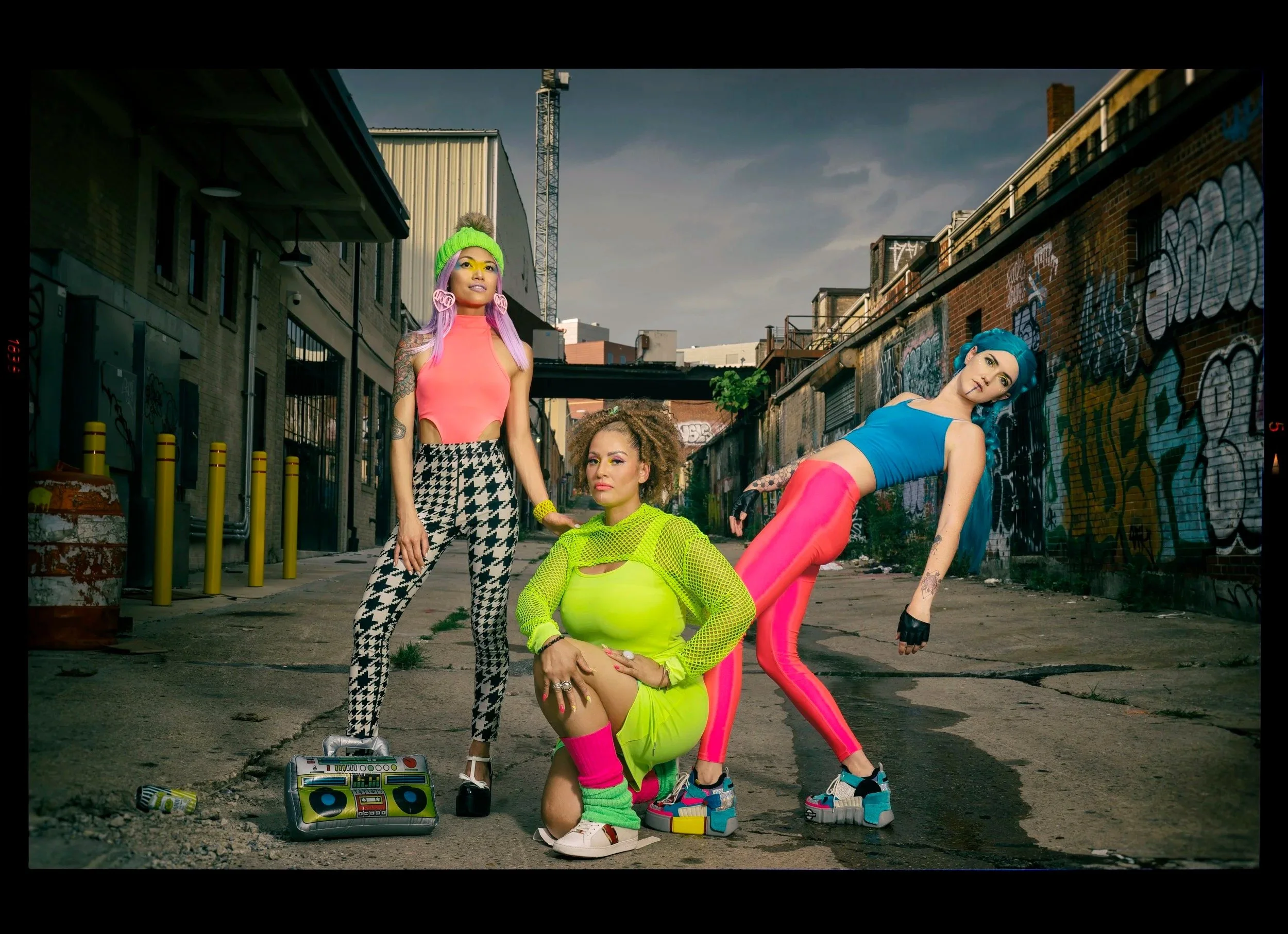 woman wearing neon suits for the photoshoot