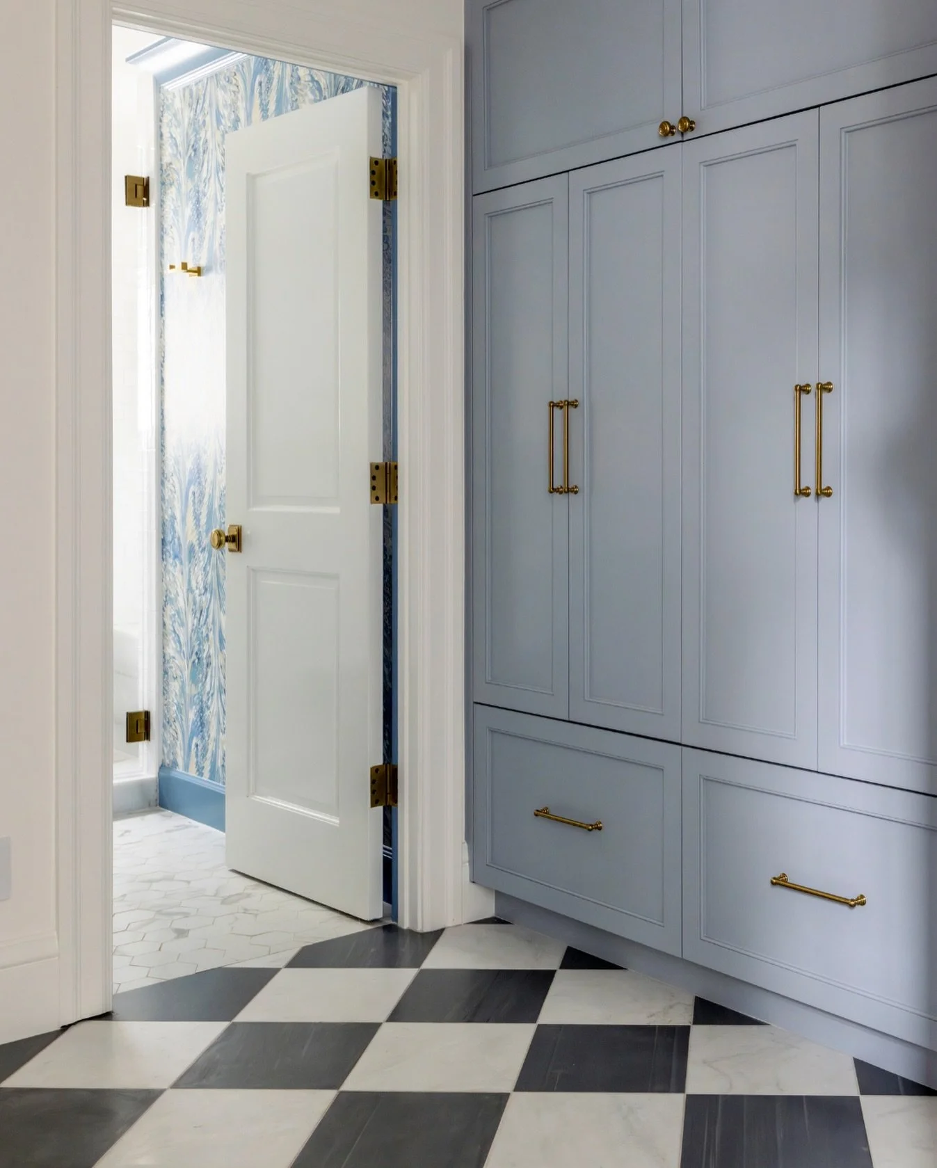 Proof that a mudroom (or laundry space) doesn&rsquo;t have to be purely practical to work hard.

Thoughtful cabinetry, beautiful hardware, and a little pattern underfoot turn an everyday pass-through into a space you actually enjoy being in. When fun