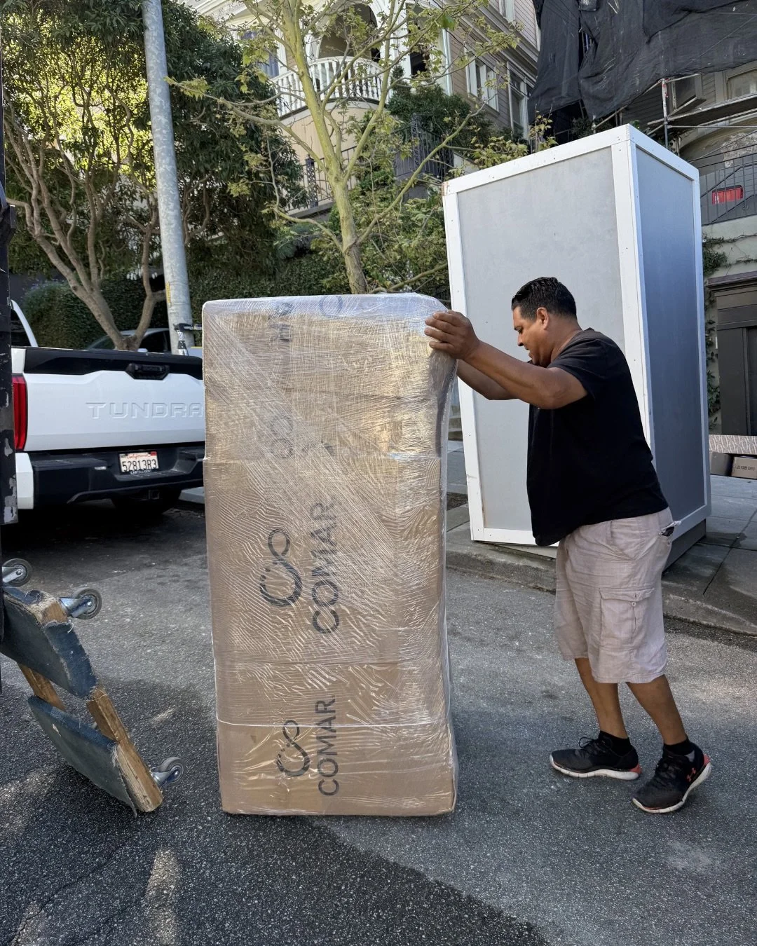 Y&rsquo;all...By some miracle, the team got the couch in the room without having to saw it in half! We did have to walk through an active construction zone to get the couches inside the space, but I think we would have done anything to make it happen