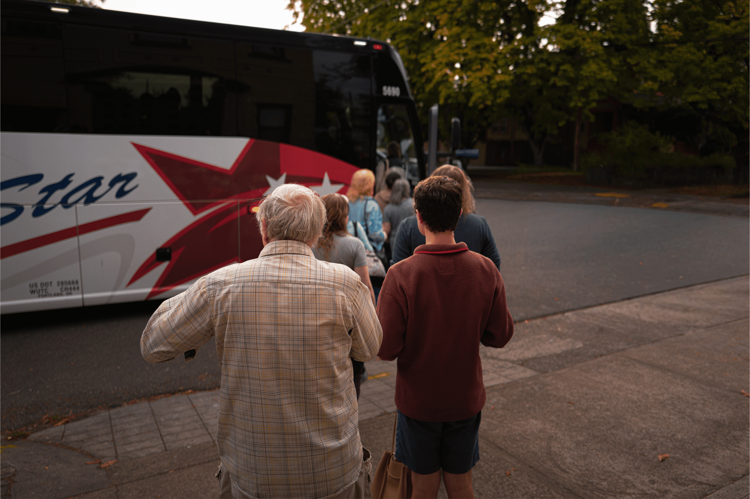  Event participants boarding the bus for the guided Kenton Roots historic neighborhood tour on September 12, 2026. Photo: Troy Winslow / Vanport Mosaic 