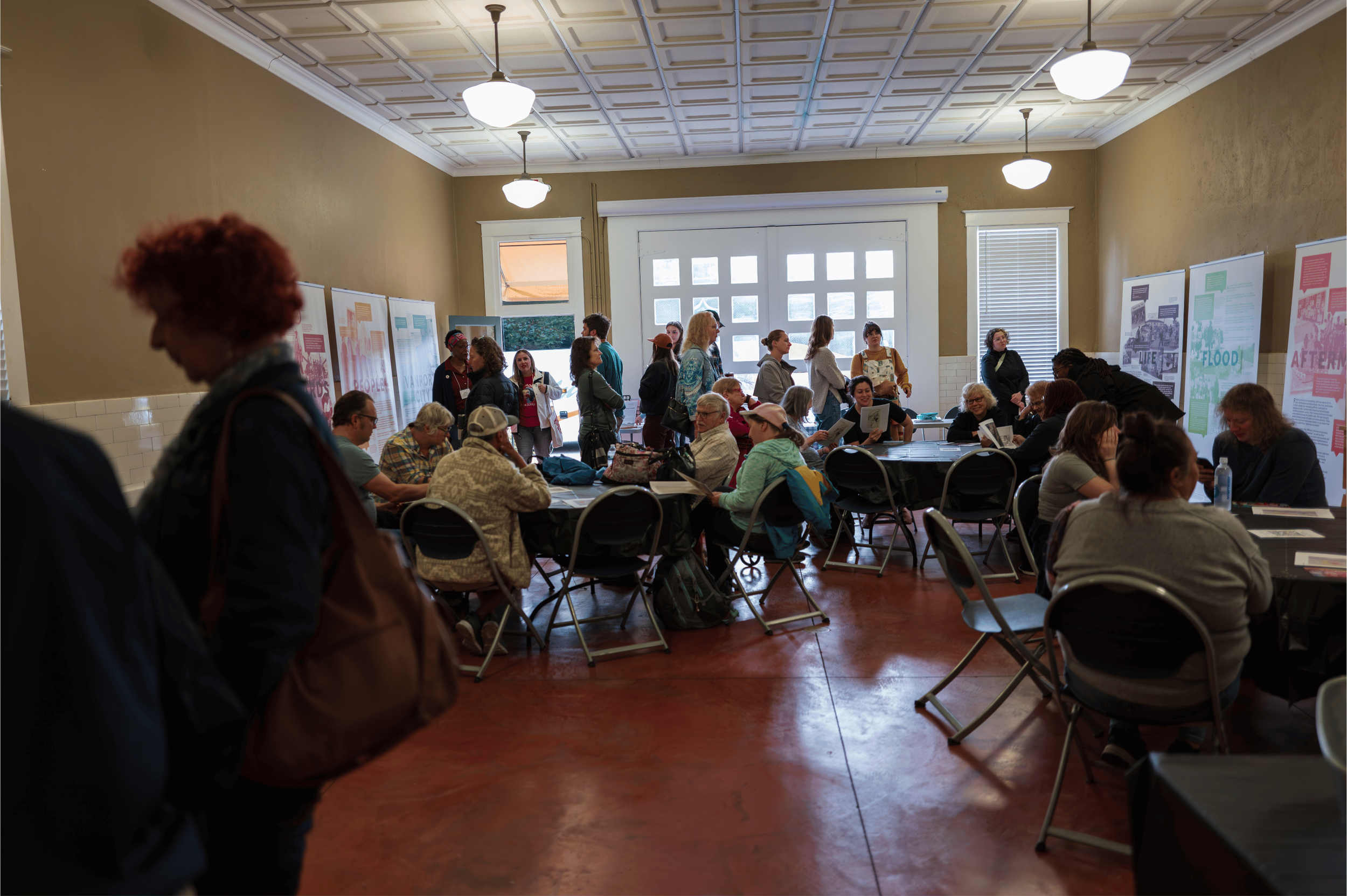  Participants engaging with historical exhibits and archival materials at the Kenton Historic Firehouse during Kenton Roots on September 12, 2026.  Photo: Troy Winslow / Vanport Mosaic.  