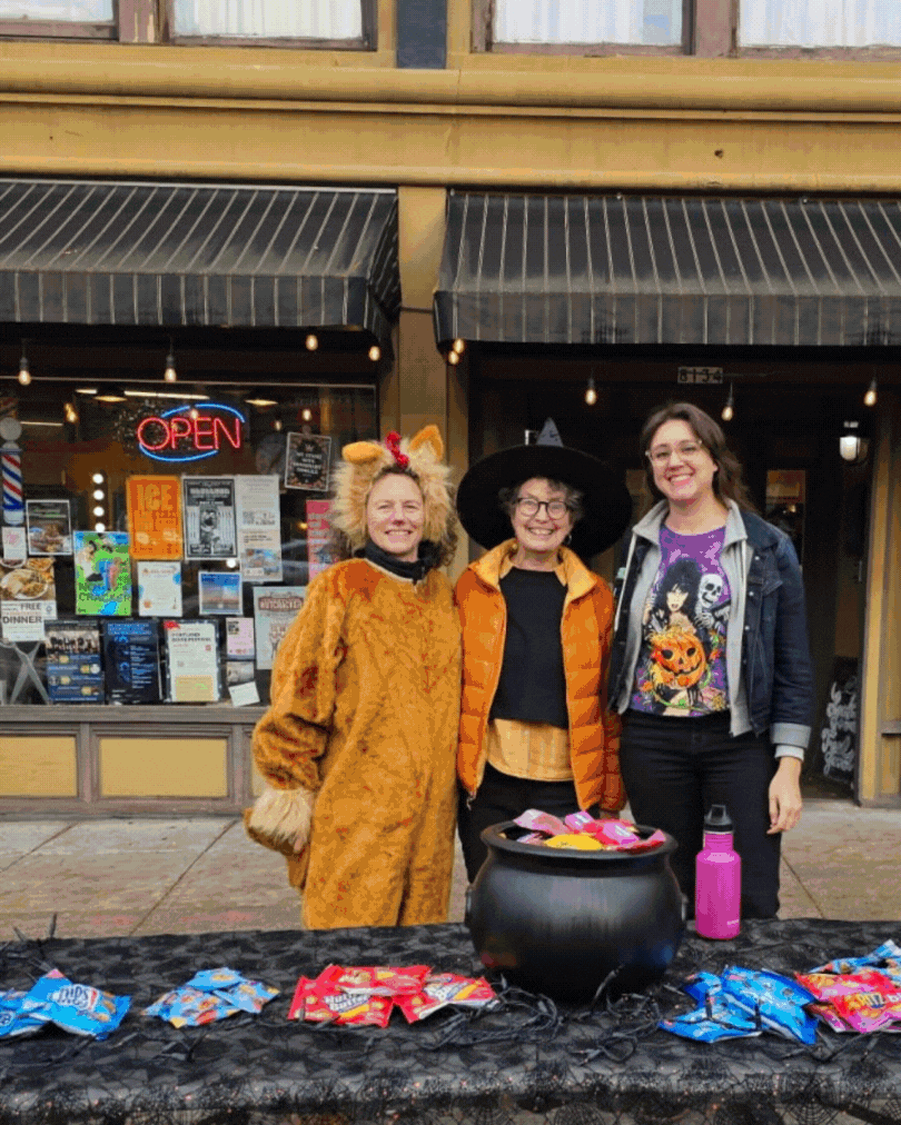 Slideshow of pictures of kids and adults dressed in Halloween costumes while attending a trick or treat event in historic downtown Kenton.