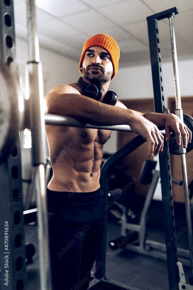 A shirtless 35-65-year-old athletic man, on the Endzone Mens Health ED treatment plan.