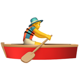 Child wearing a hat rowing a small red boat with a yellow paddle