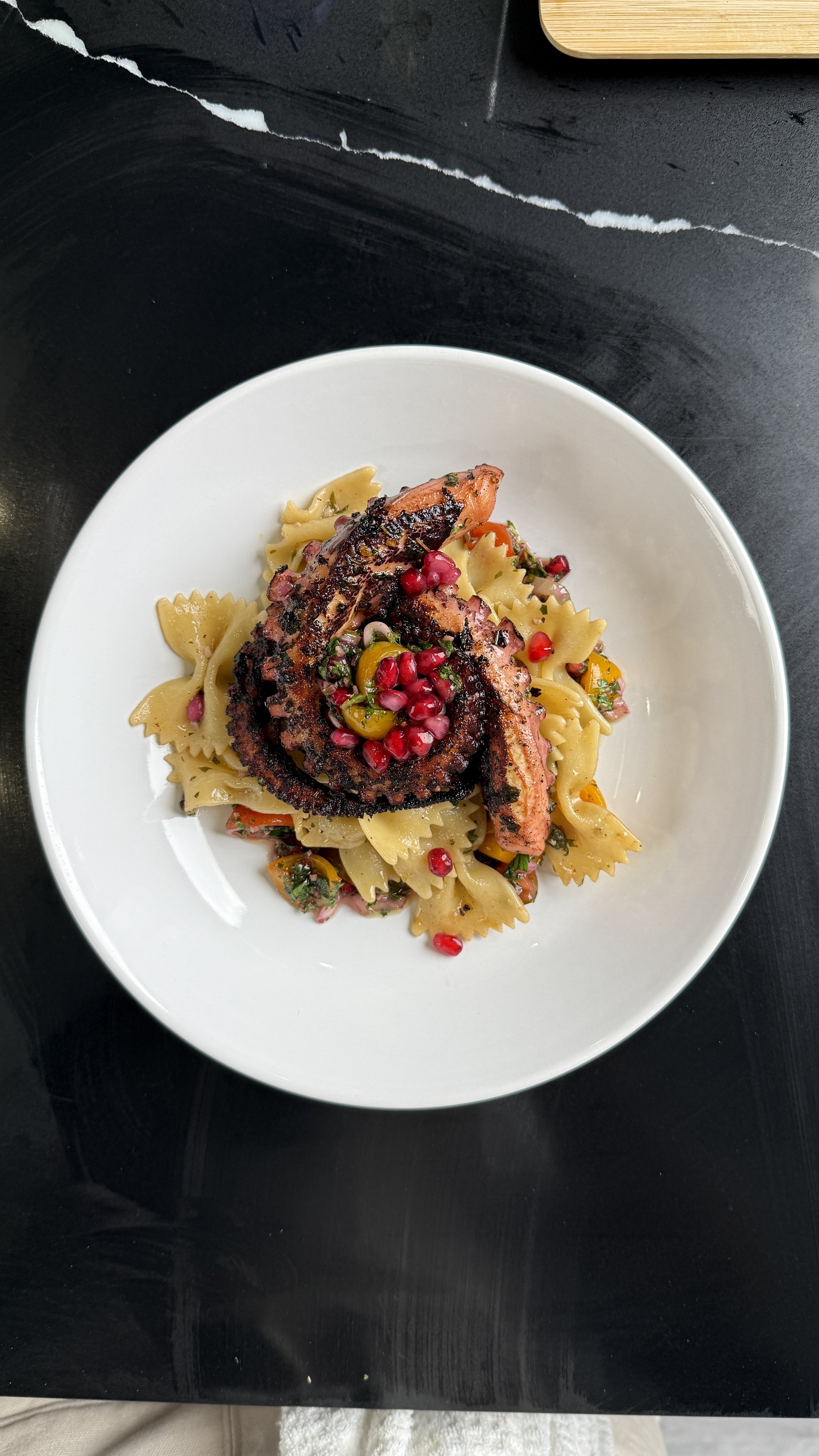 Fresh pasta course thoughtfully plated for a private dining experience by Chino Angles.