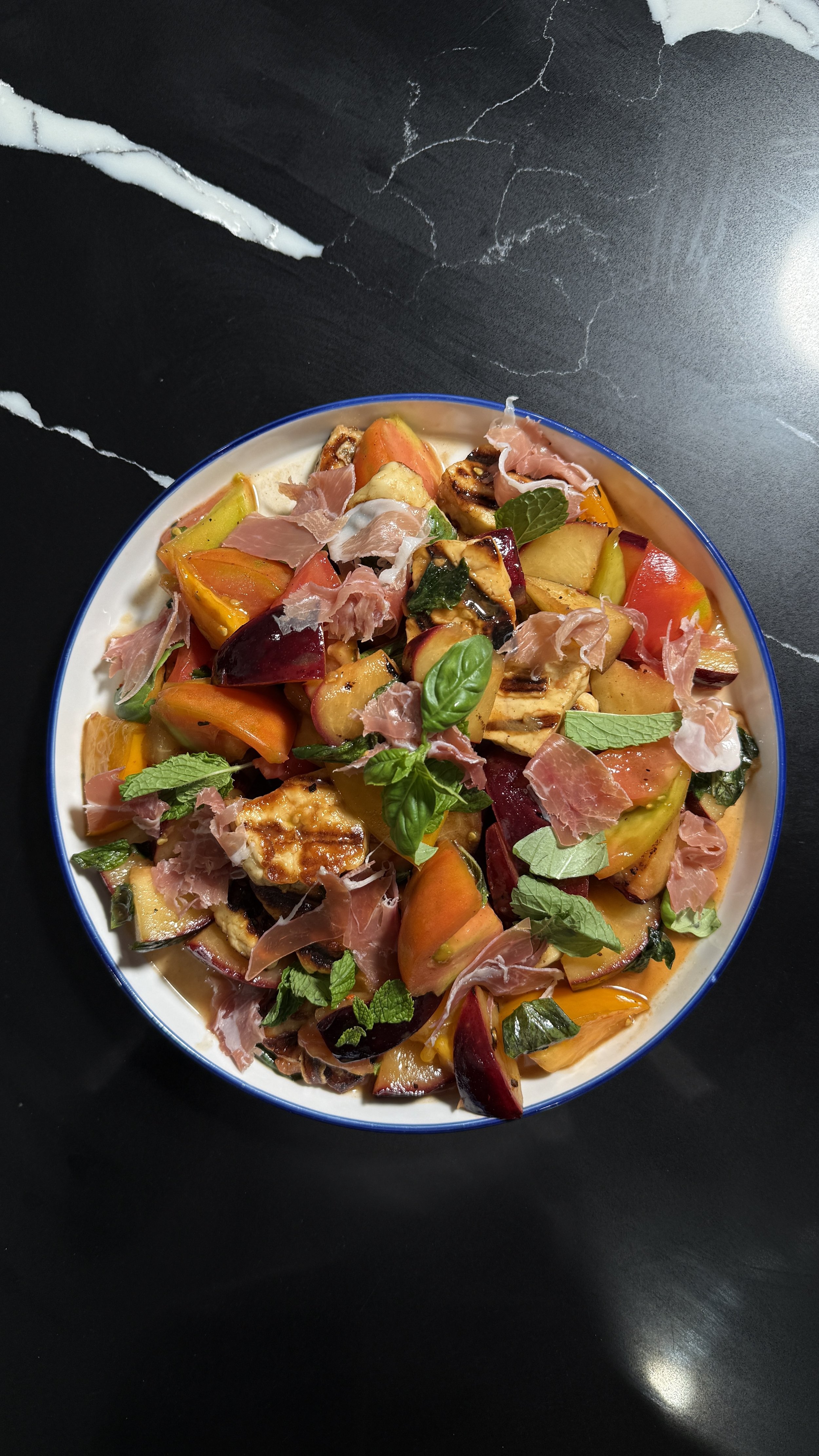Recipe: Plum &amp; Heirloom Tomato Caprese with Halloumi and Prosciutto