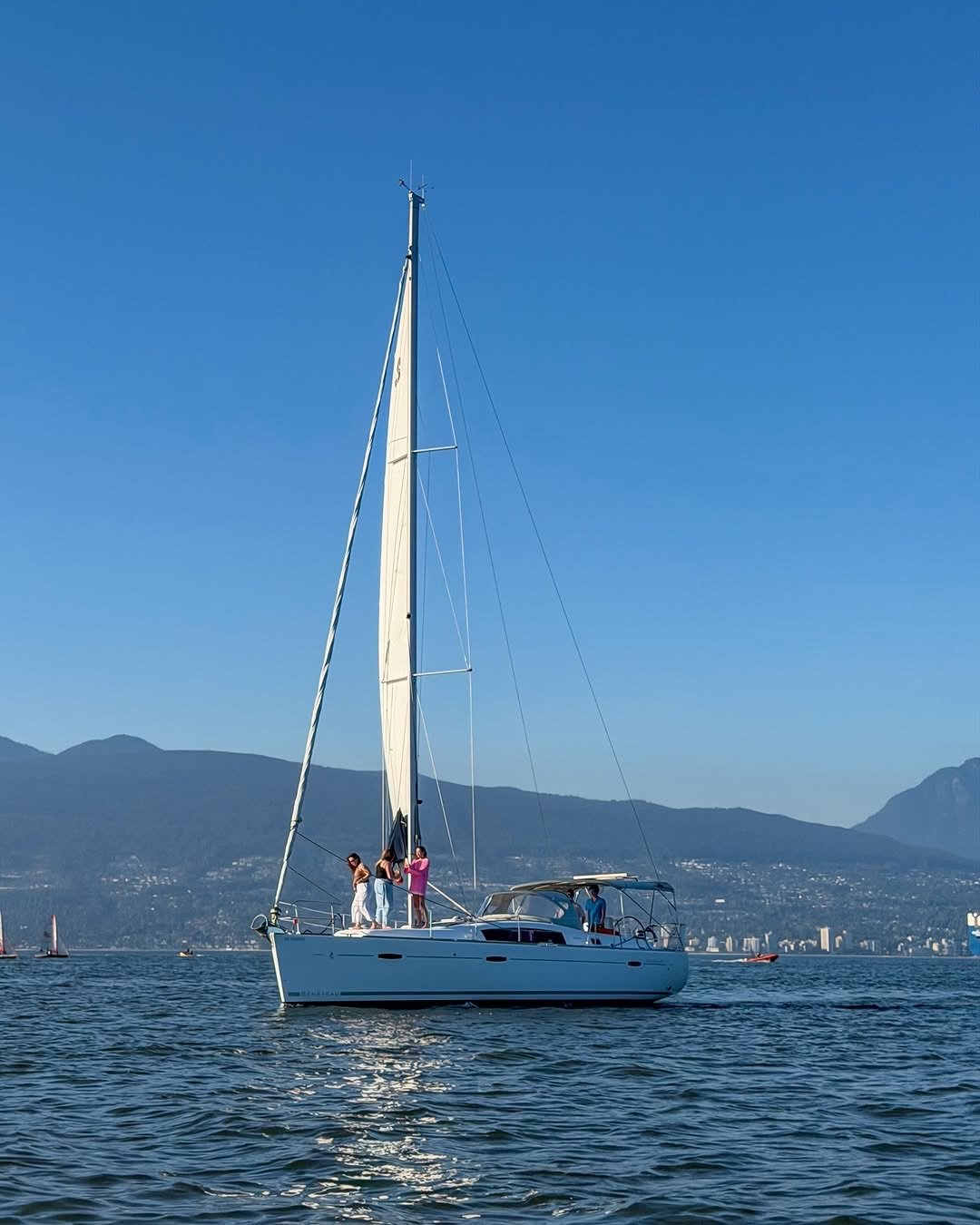 There&rsquo;s something about summer in Vancouver that feels almost cinematic.

The stillness of the harbour. The glow on the water. Snow-touched peaks watching over long afternoons with good company.
Days here move differently.. Slower, lighter, sof