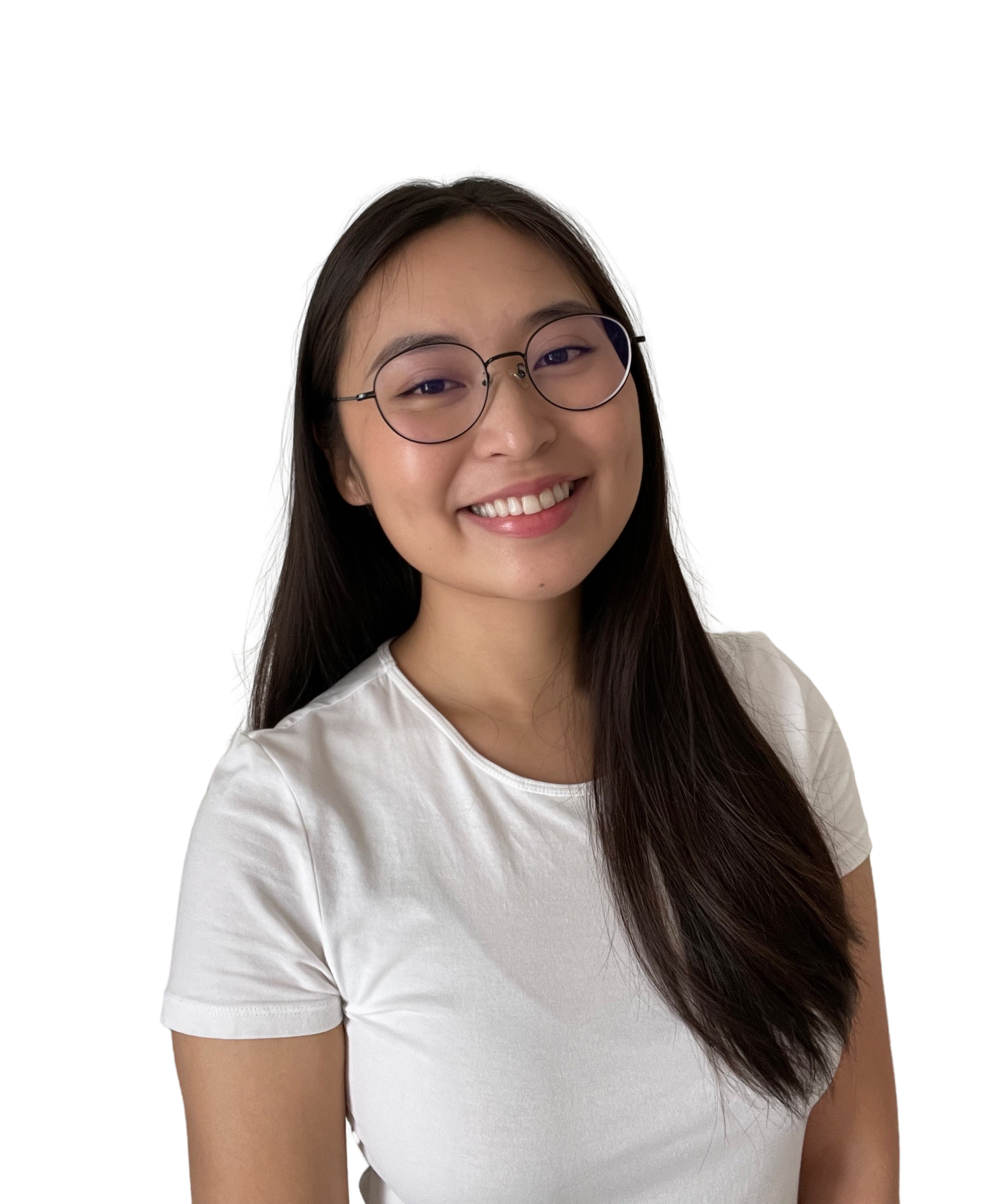 A young woman with glasses and long dark hair smiling at the camera, wearing a white t-shirt.