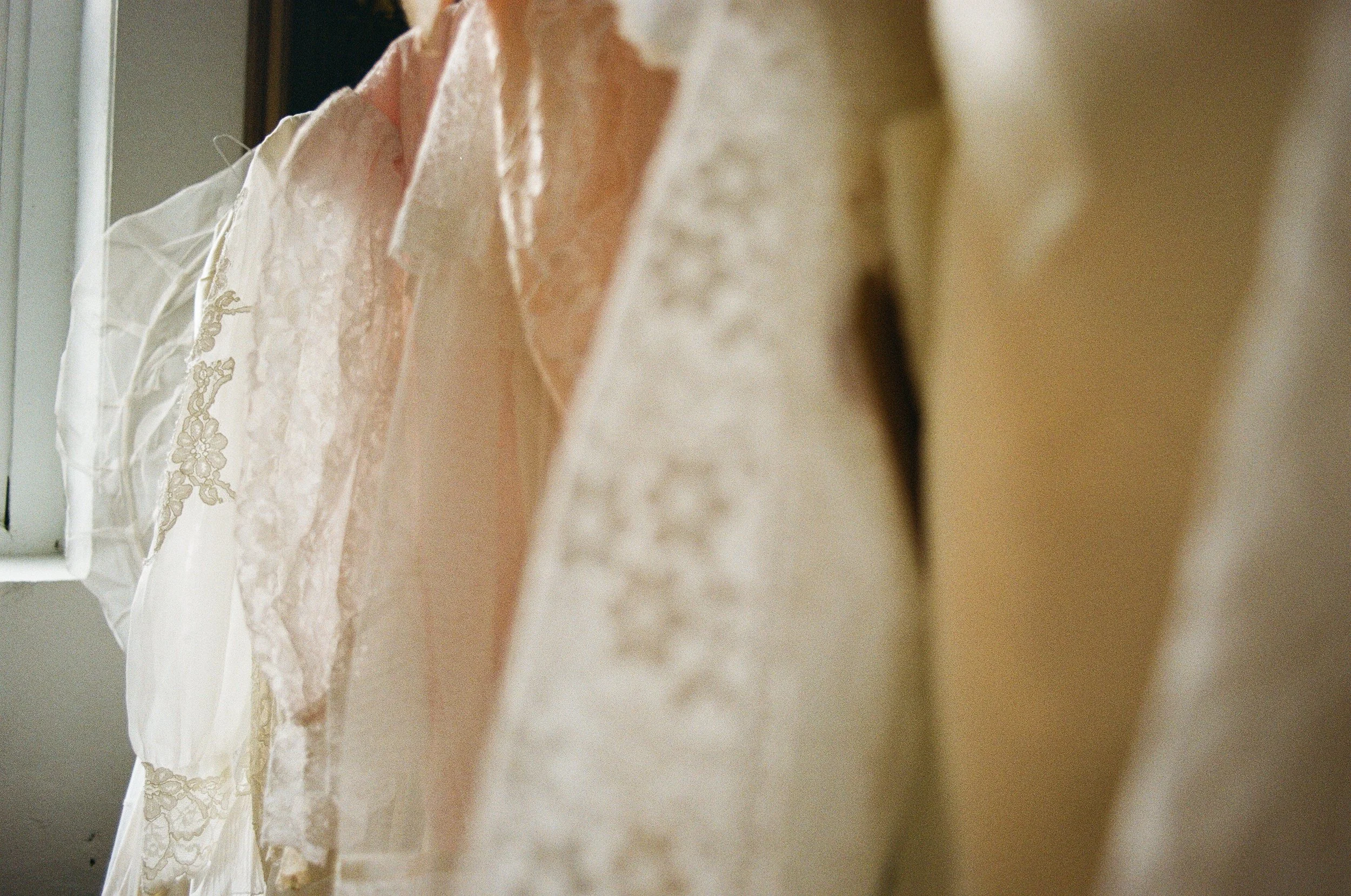 Vintage wedding dresses on a rack
