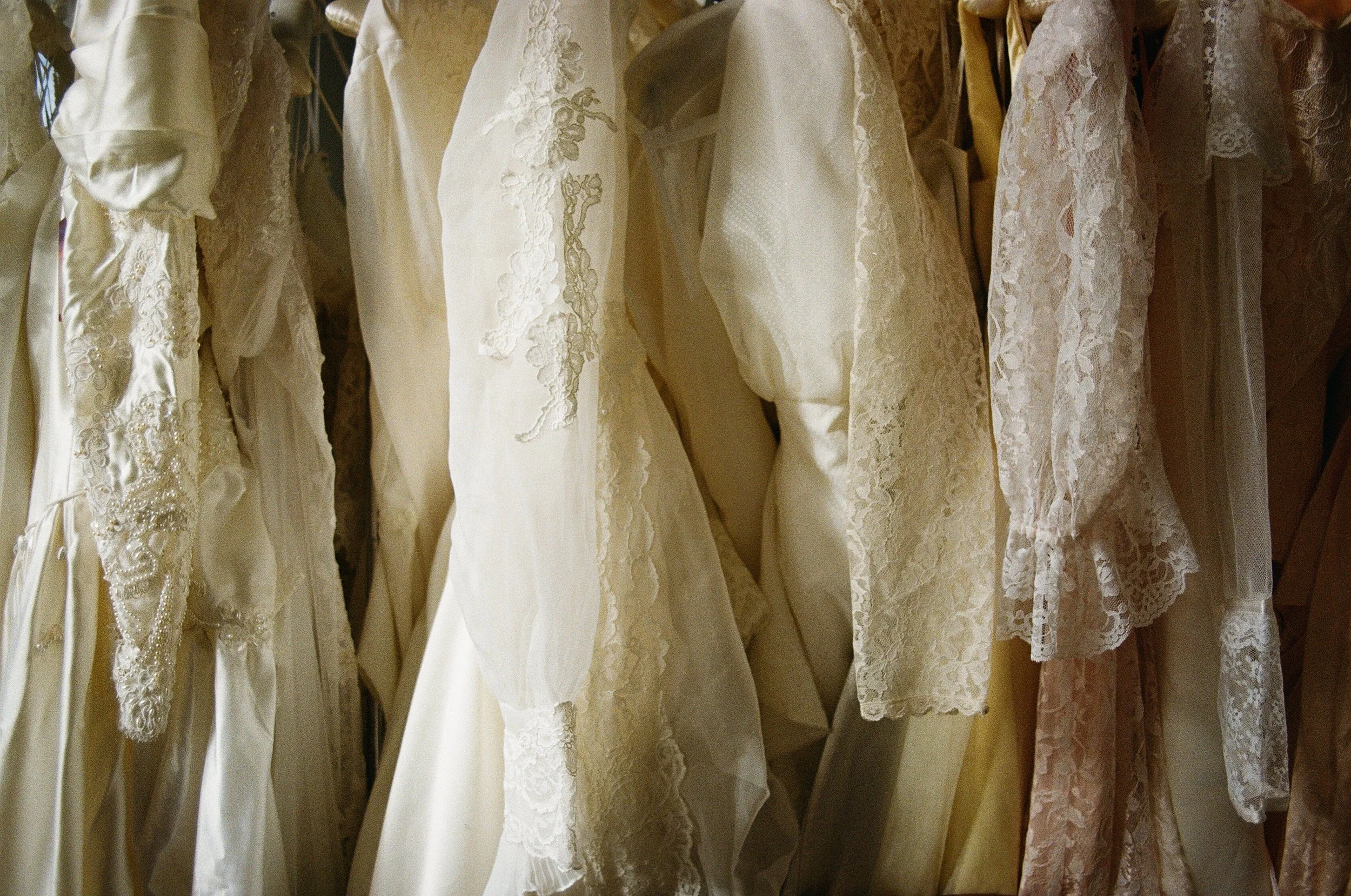 Vintage wedding dresses on a rack