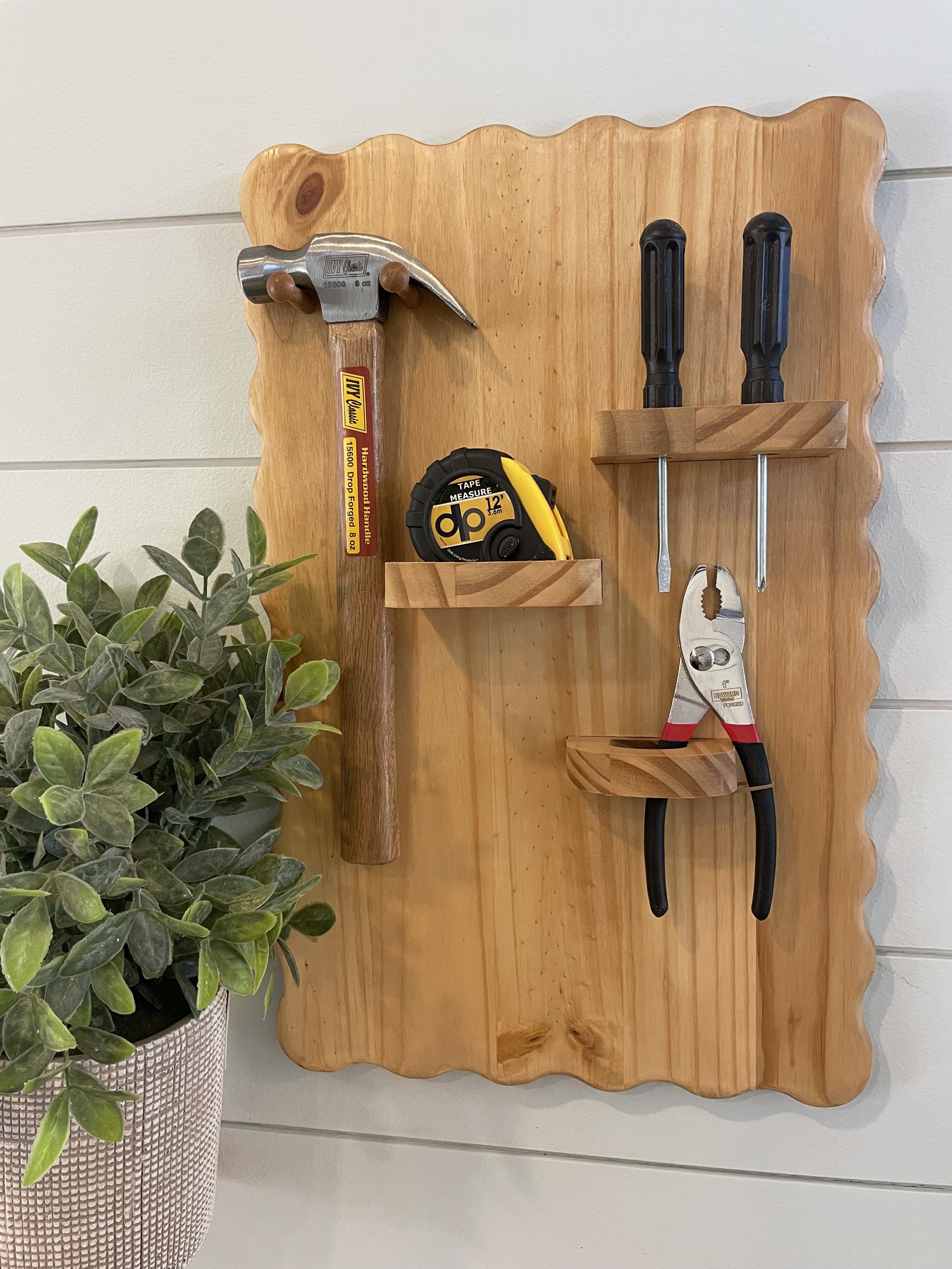 Knotty Pine w tools on the wall.jpg