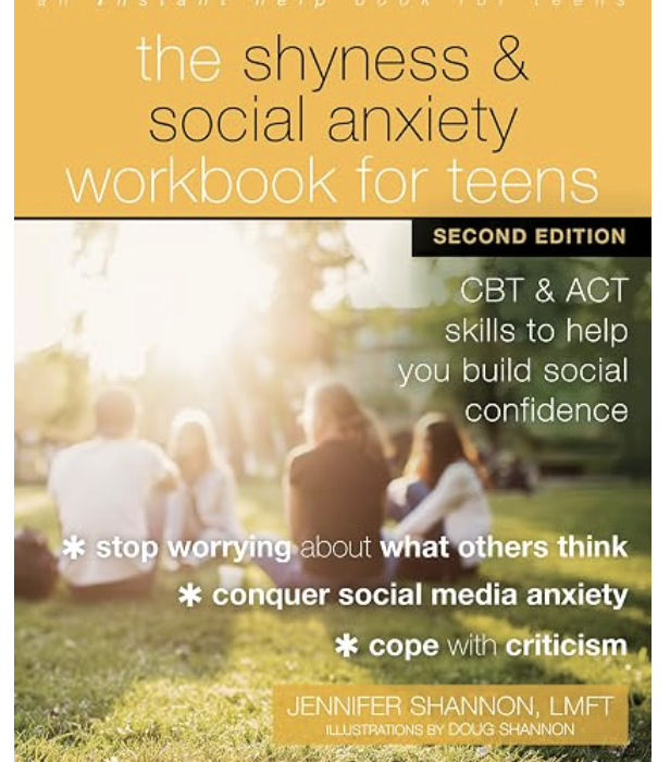 Cover of a workbook titled "The Shyness & Social Anxiety Workbook for Teens," Second Edition, authored by Jennifer Shannon. The cover features an outdoor scene with a group of teenagers sitting on grass, blurred background, and a warm sunlight glow.