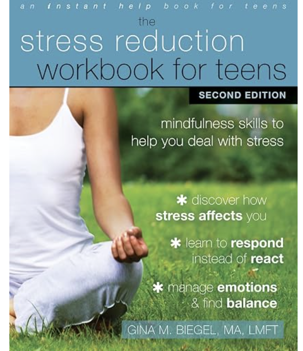 Cover of a workbook titled 'The Stress Reduction Workbook for Teens'. It features a person sitting cross-legged outdoors on grass, dressed in white, with trees in the background. The text highlights mindfulness skills to manage stress, discover stress effects, learn to respond instead of react, and manage emotions for balance.
