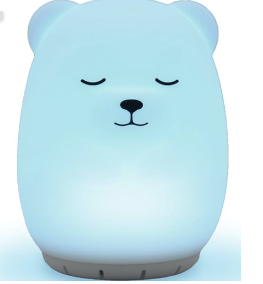 A light blue, bear-shaped Bluetooth speaker with closed eyes and a small smile.