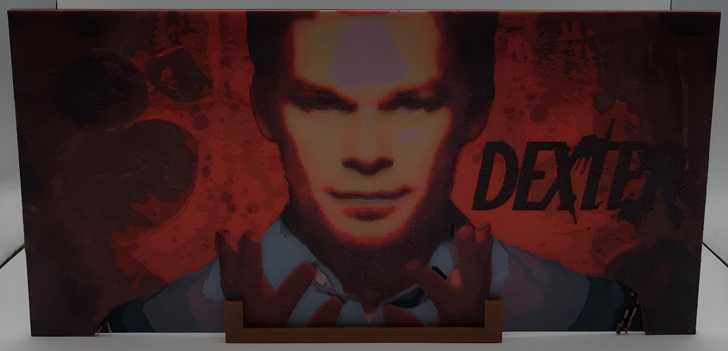 3D Print of the character Dexter. 

Glows when exposed to UV
(Regular Lighting)