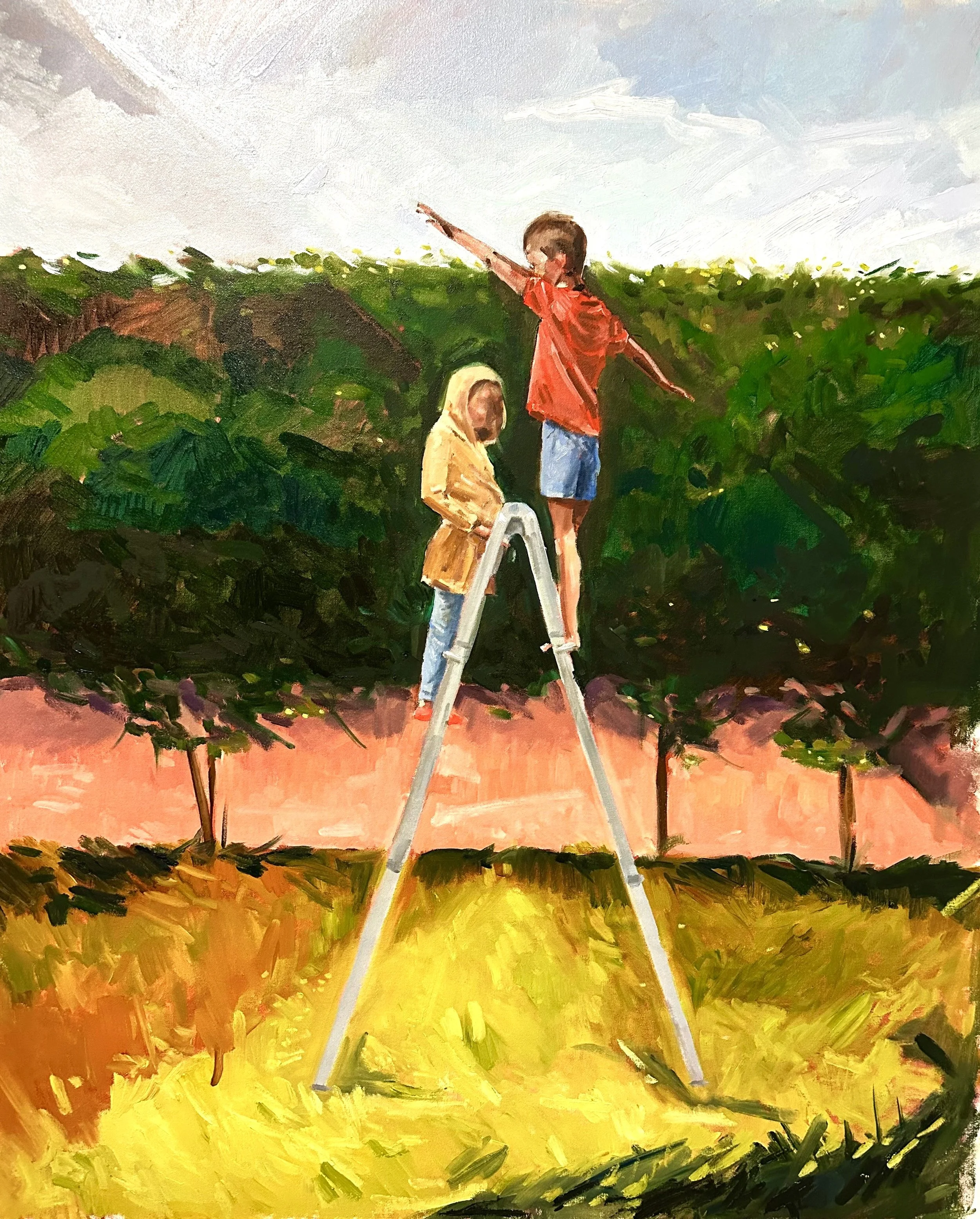 Children picking fruit in an orchard, with one child standing on a ladder and pointing outward, and another child standing beside, both surrounded by green trees and a blue sky.