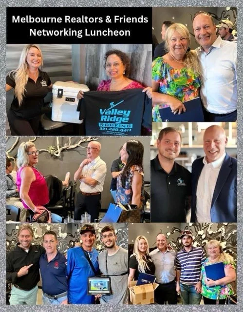 Group of people at a networking luncheon, some holding items like a sewing machine, Valley Ridge Roofing banner, and a tablet, in a decorated indoor setting.