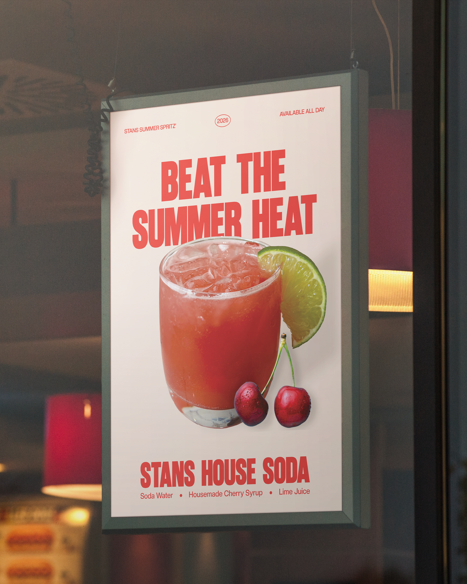 A restaurant sign advertising a summer soda drink with the text 'Beat the Summer Heat' and an image of a cherry lime soda with lime and cherries, with the ingredients listed as soda water, homemade cherry syrup, and lime juice.