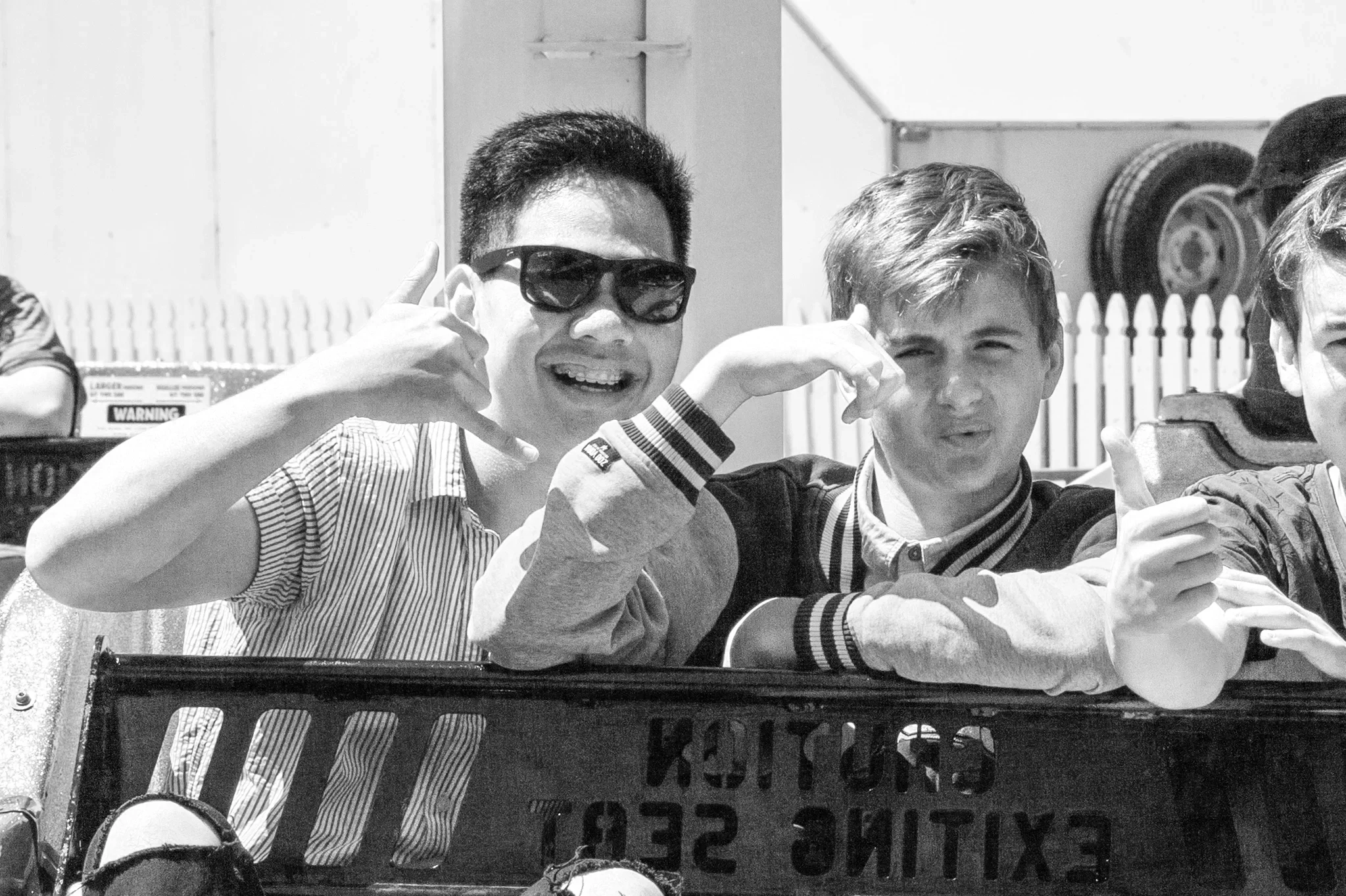 Joel Chan and Luke Howis on a carnival ride during Luke's teenage years — a discipleship relationship that transformed into a friendship and later, partners in writing worship for God.