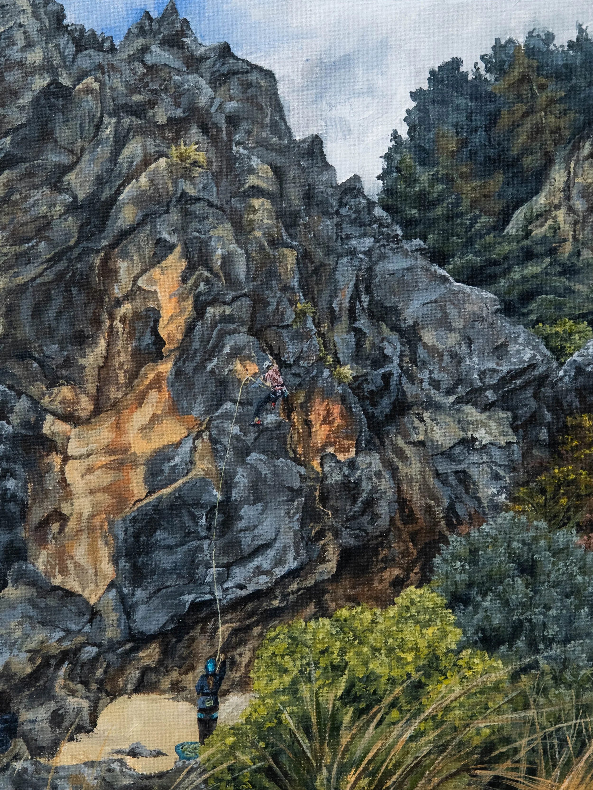 A painting depicting two climbers scaling a rugged rock face near a forested hillside.