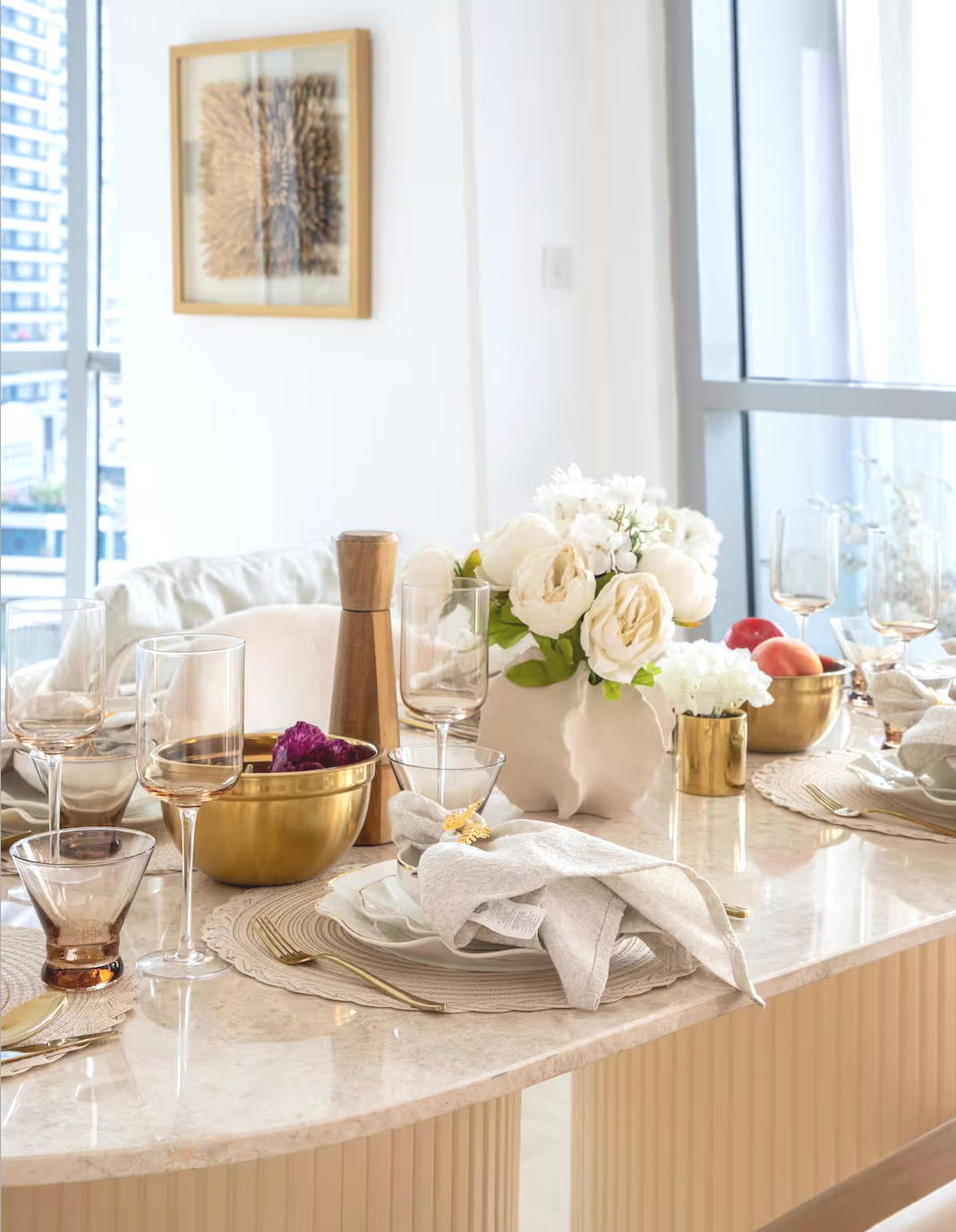 Thoughtfully styled dining table reflecting a warm, cohesive and inviting interior atmosphere.
