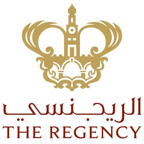 A gold crown above a silhouette of a castle with Arabic and English text that reads 'The Regency'.