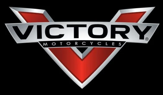 Victory Motorcycles logo with a large red and black V design.