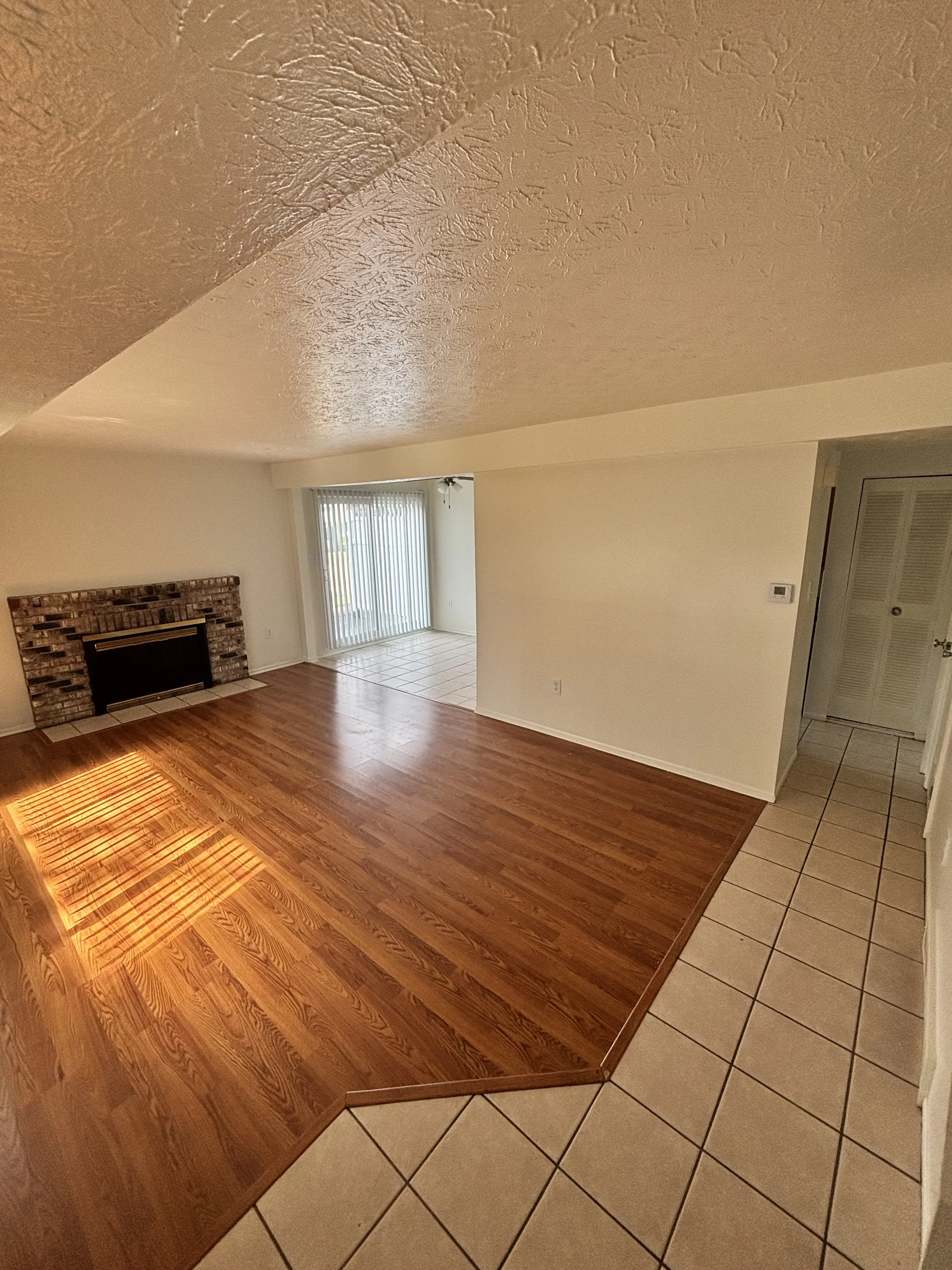 Oranssi technician working on a roof project