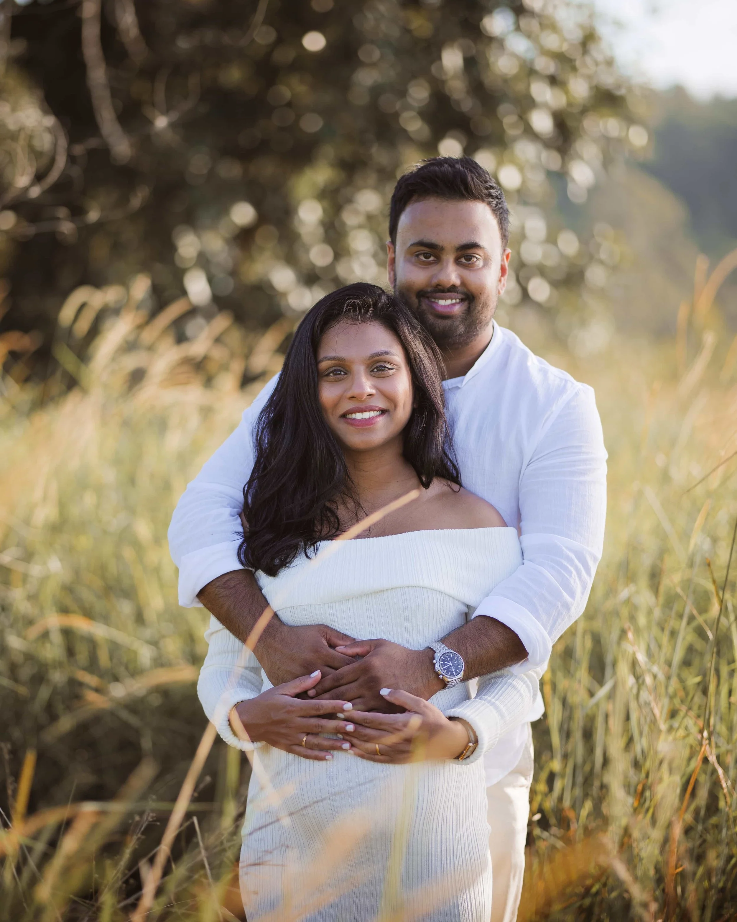 couple posing in park