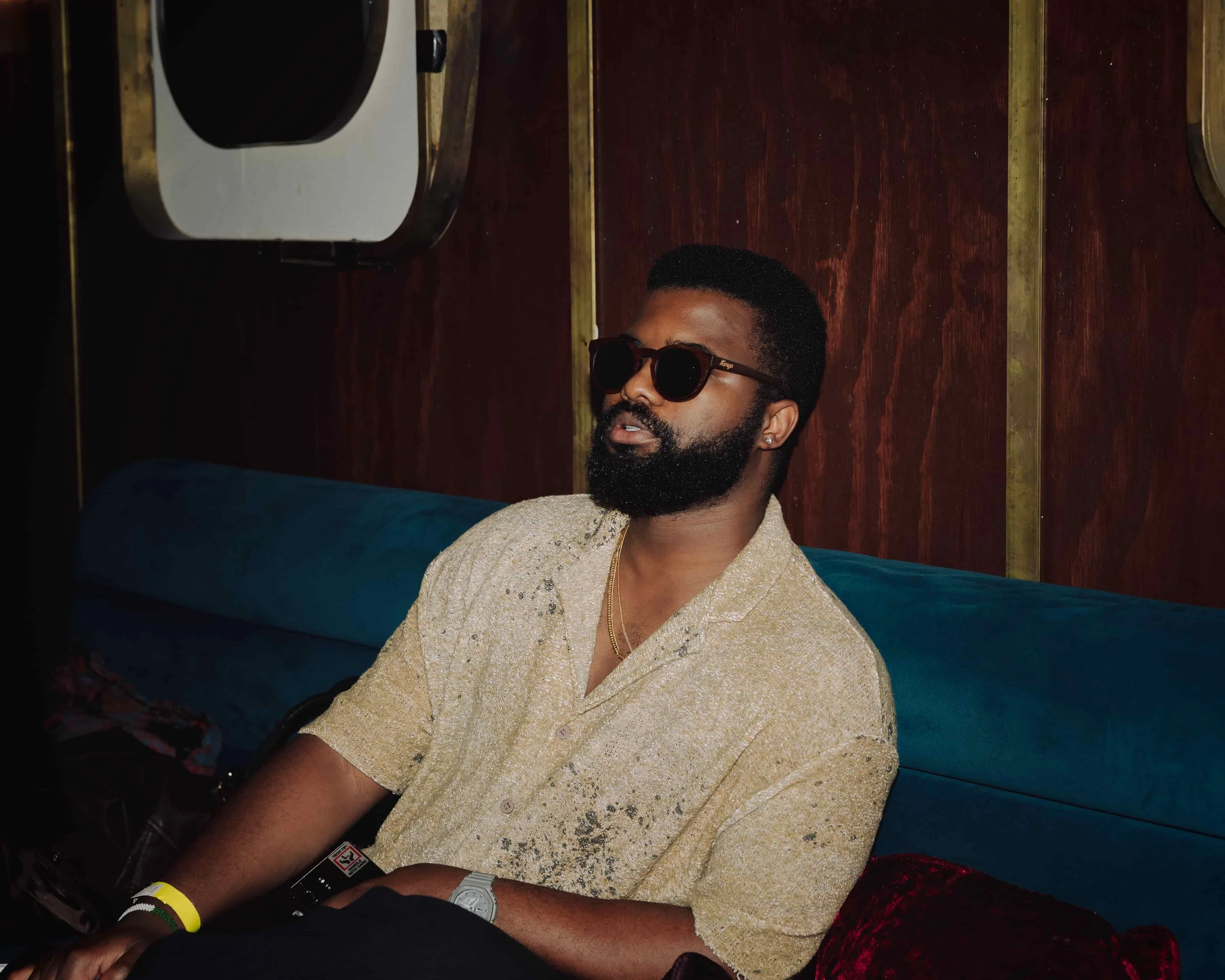 black man sitting in bar
