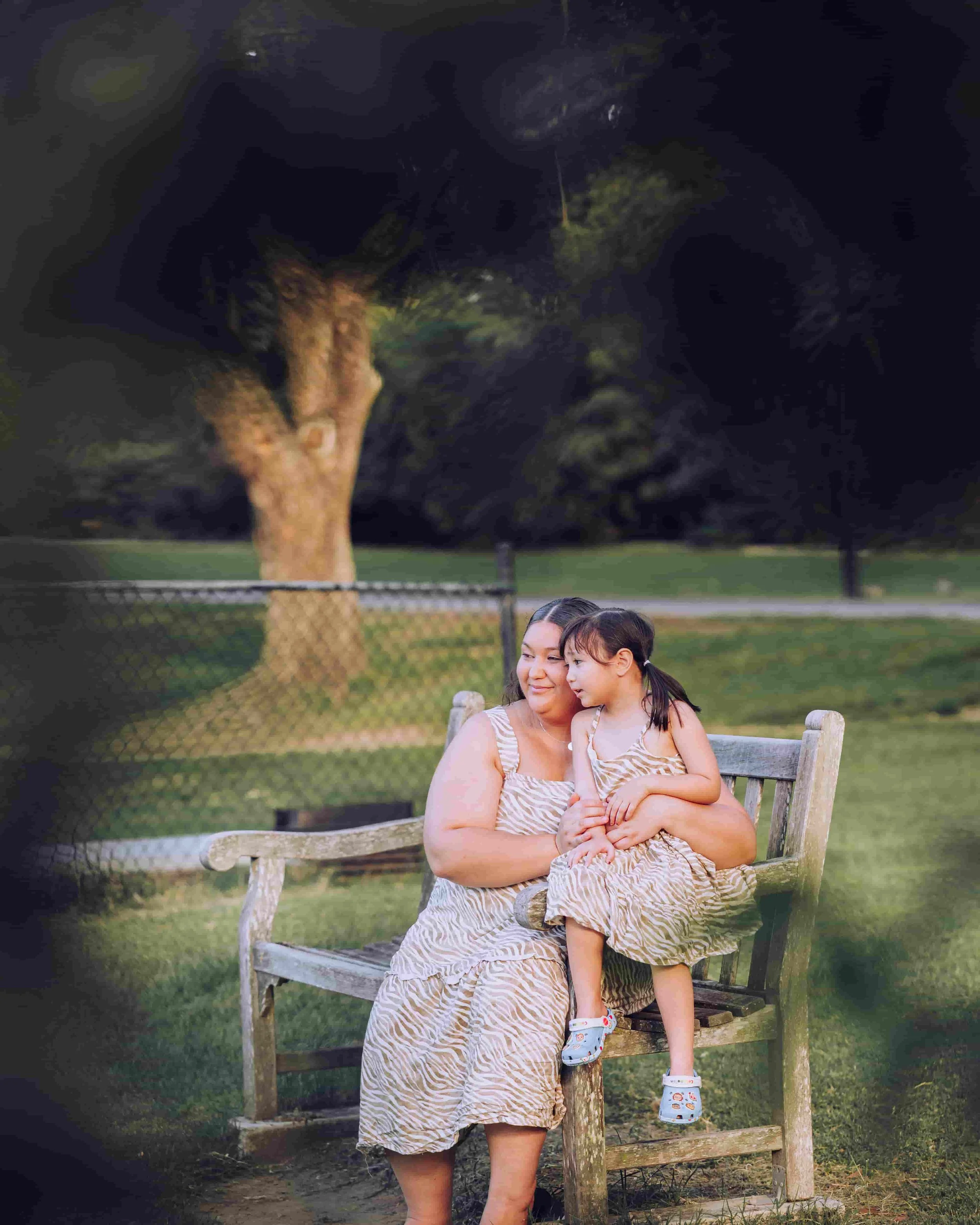 Mother and daughter on a bench